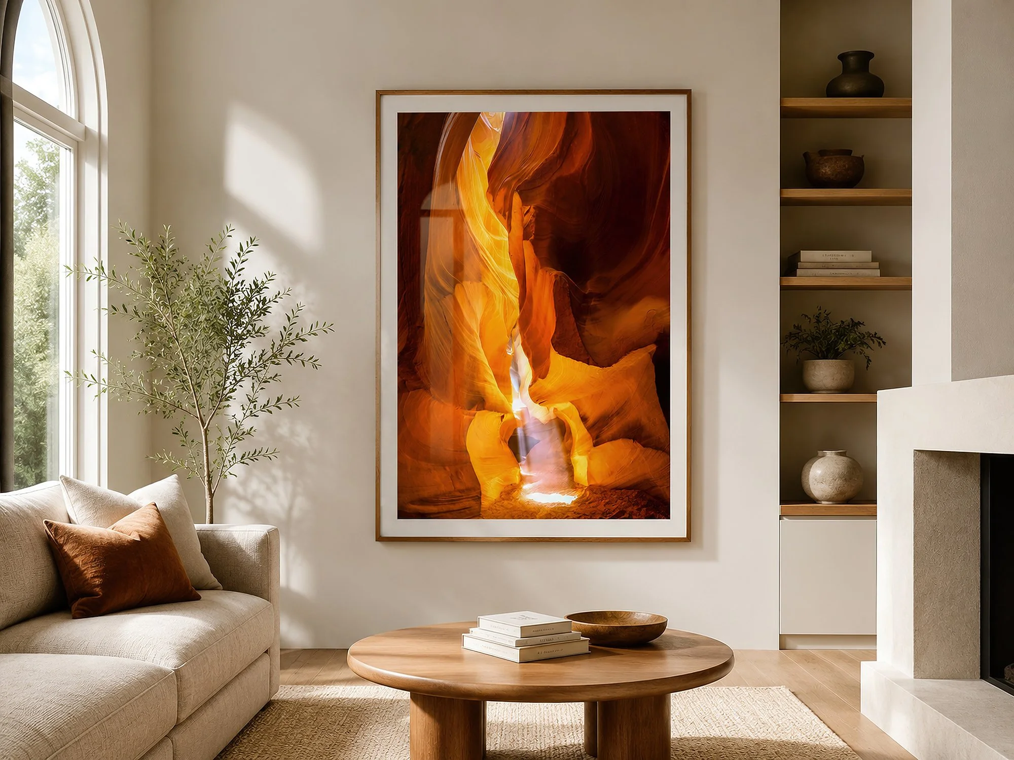 Framed Antelope Canyon photograph displayed behind subtly reflective glass in a bright minimalist living room with warm timber furniture, neutral décor and no people — Nick Psomiadis at NIKART Studio and Gallery.