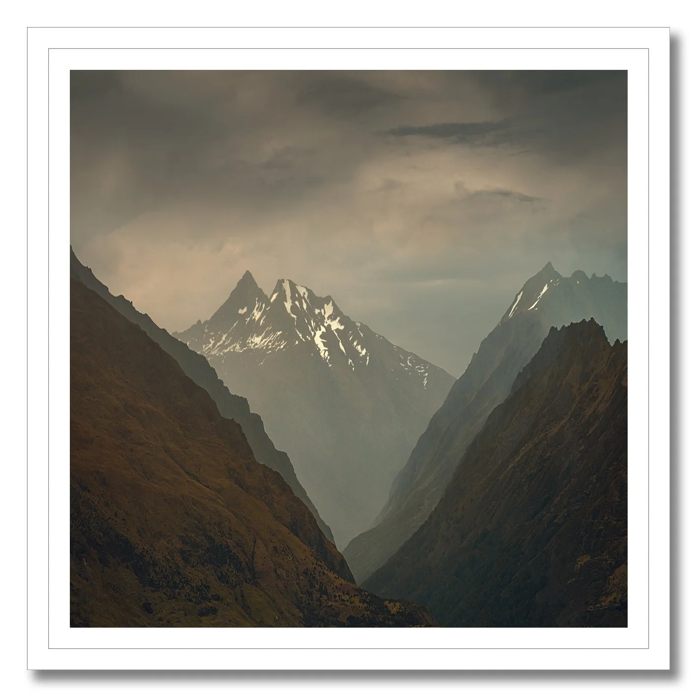 Mountain valley photography with snow peaks in New Zealand