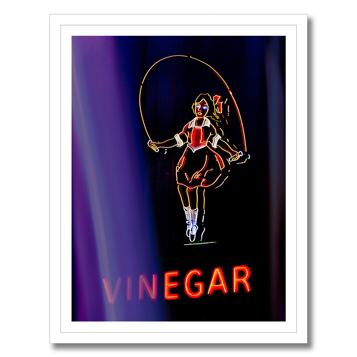 Neon photograph of Skipping Girl sign behind purple curtain light