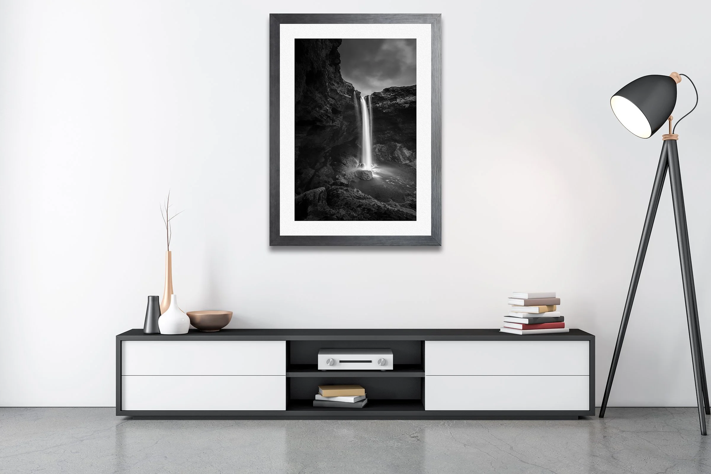 Black and white photograph of Kvernufoss waterfall flowing through a dramatic Icelandic gorge