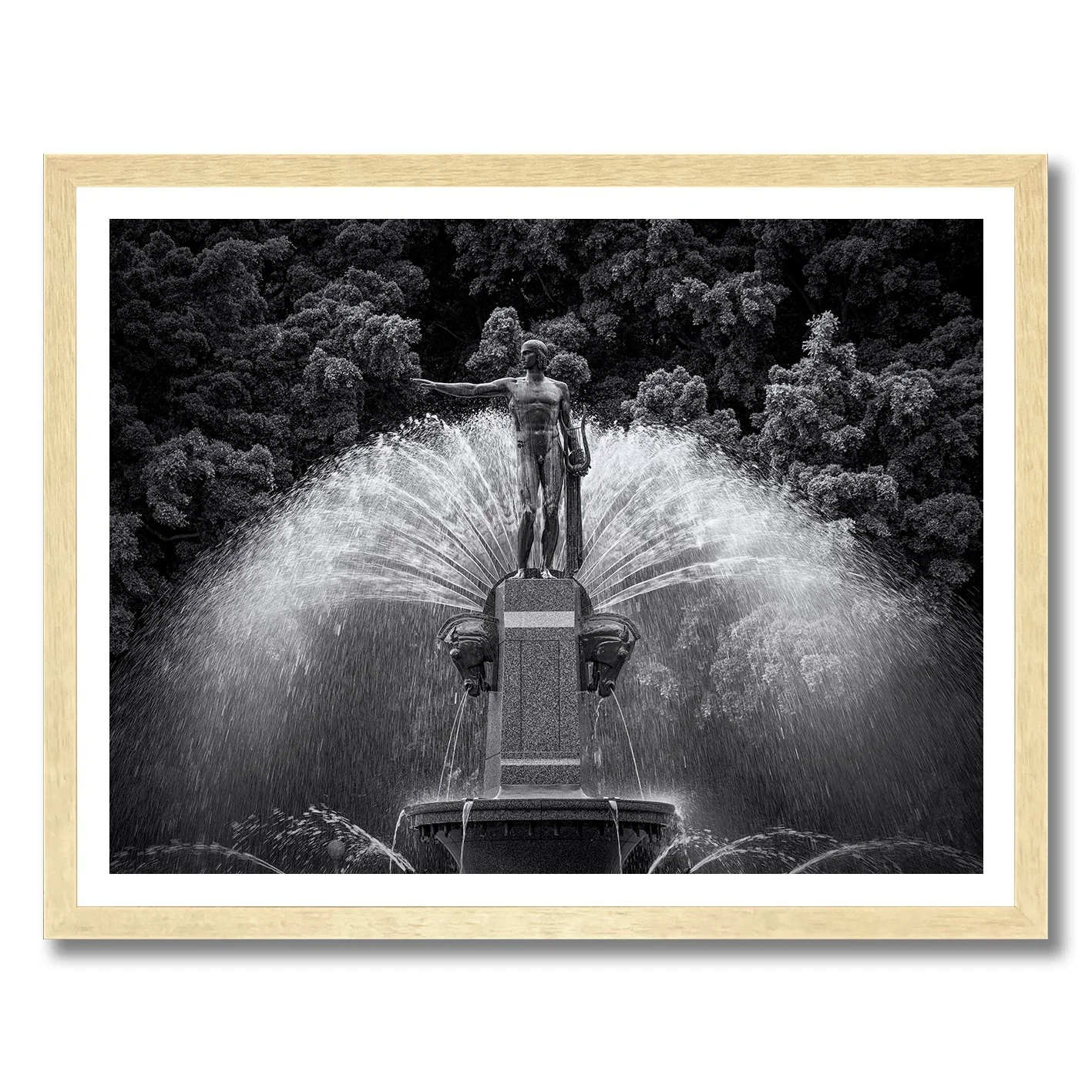 Black and white photograph of the Archibald Fountain statue with water spray in Hyde Park