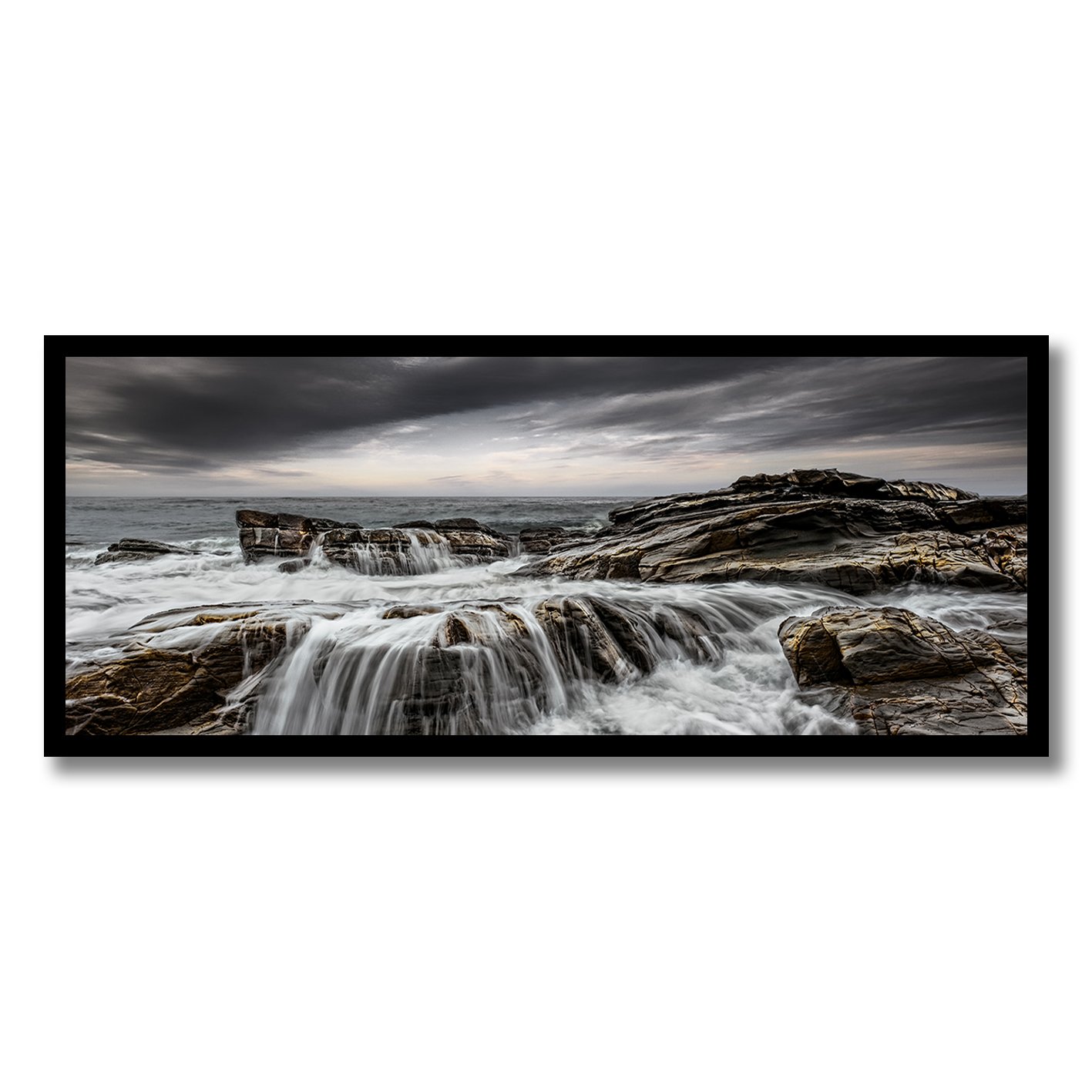 Fine art photograph of rugged coastline and cascading waves along the Great Ocean Road