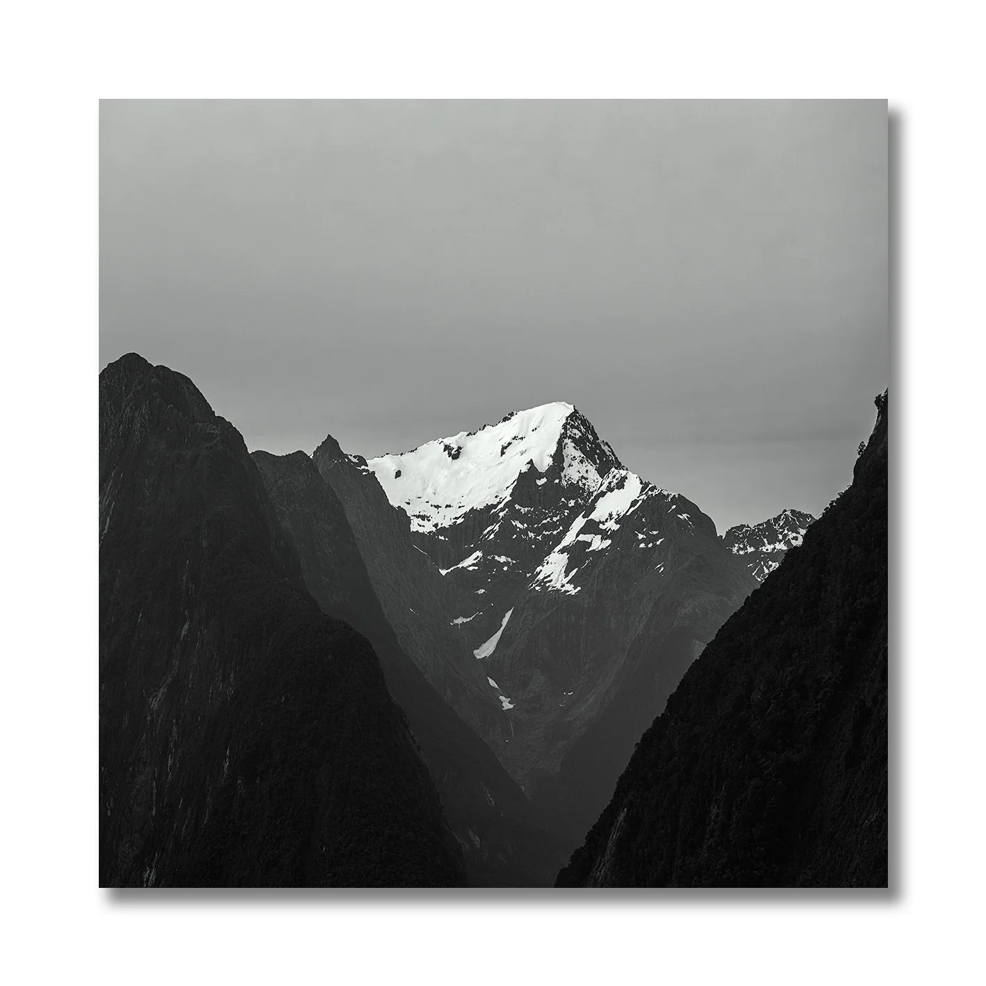 black and white mountain landscape at milford sound new zealand