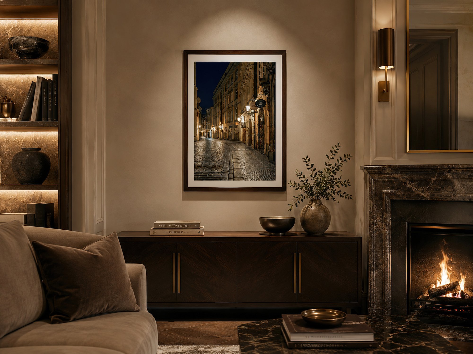 Medium-sized framed Prague night street photograph in a luxurious warm-toned living room with marble fireplace, dark timber cabinetry and ambient lighting by Nick Psomiadis at NIKART Studio and Gallery