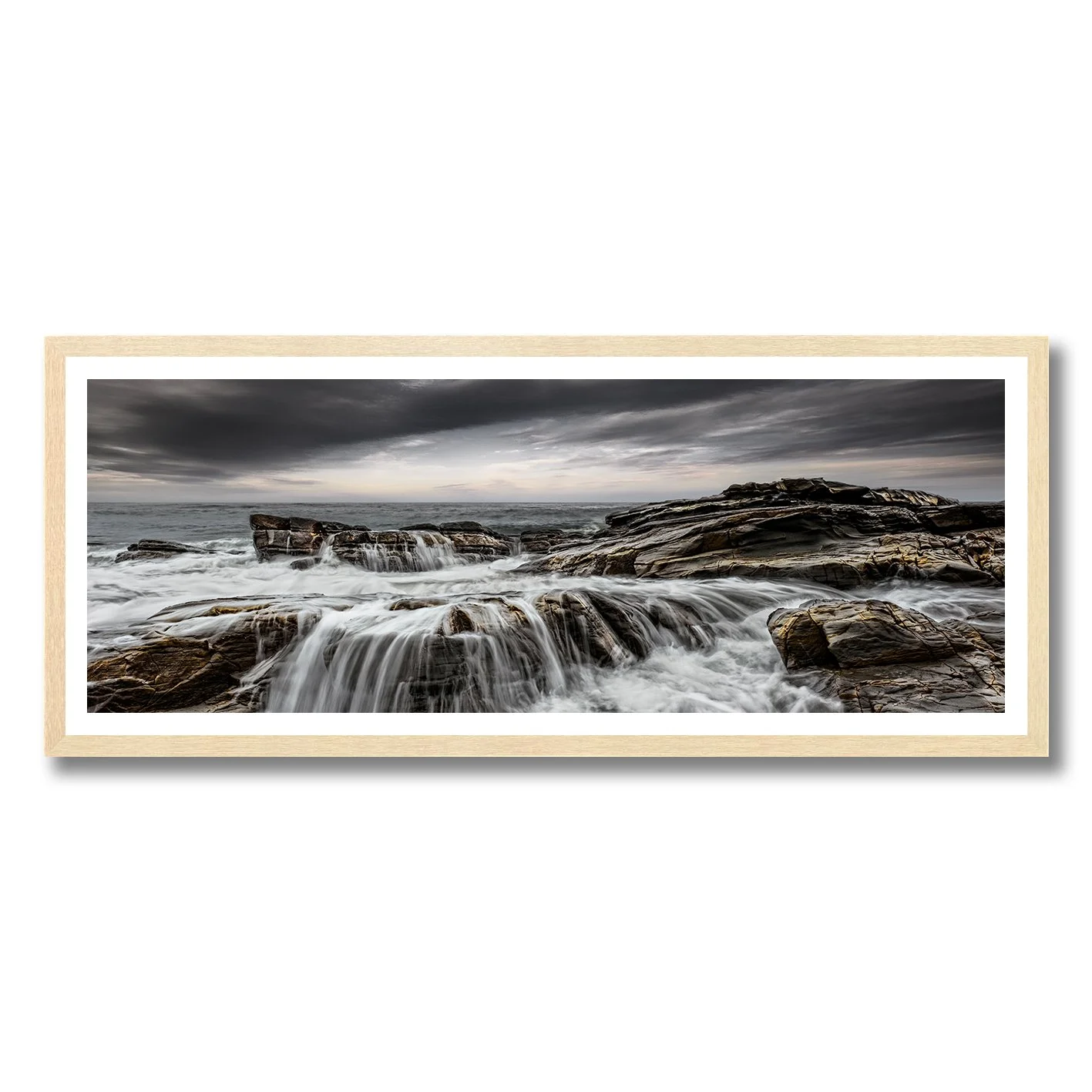 Fine art photograph of rugged coastline and cascading waves along the Great Ocean Road