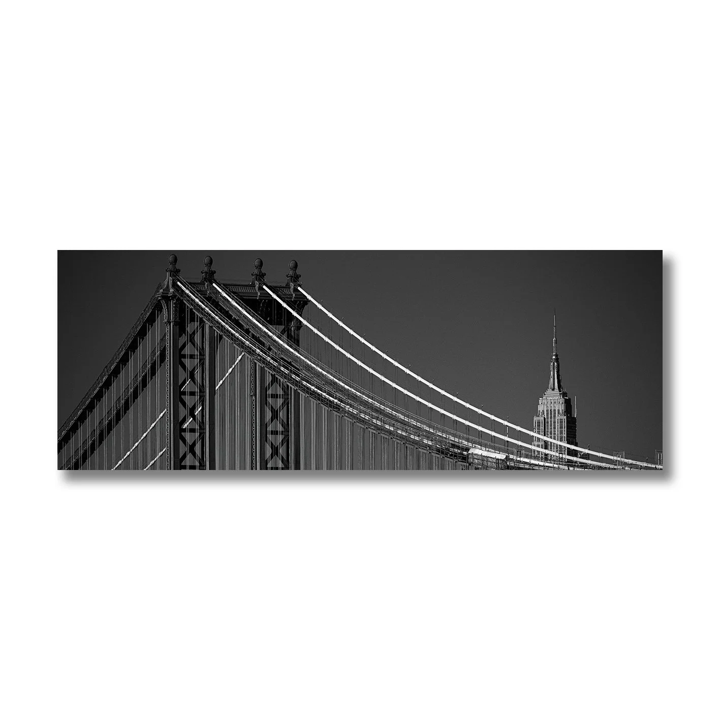 Black and white panoramic photograph of Manhattan Bridge and Empire State Building
