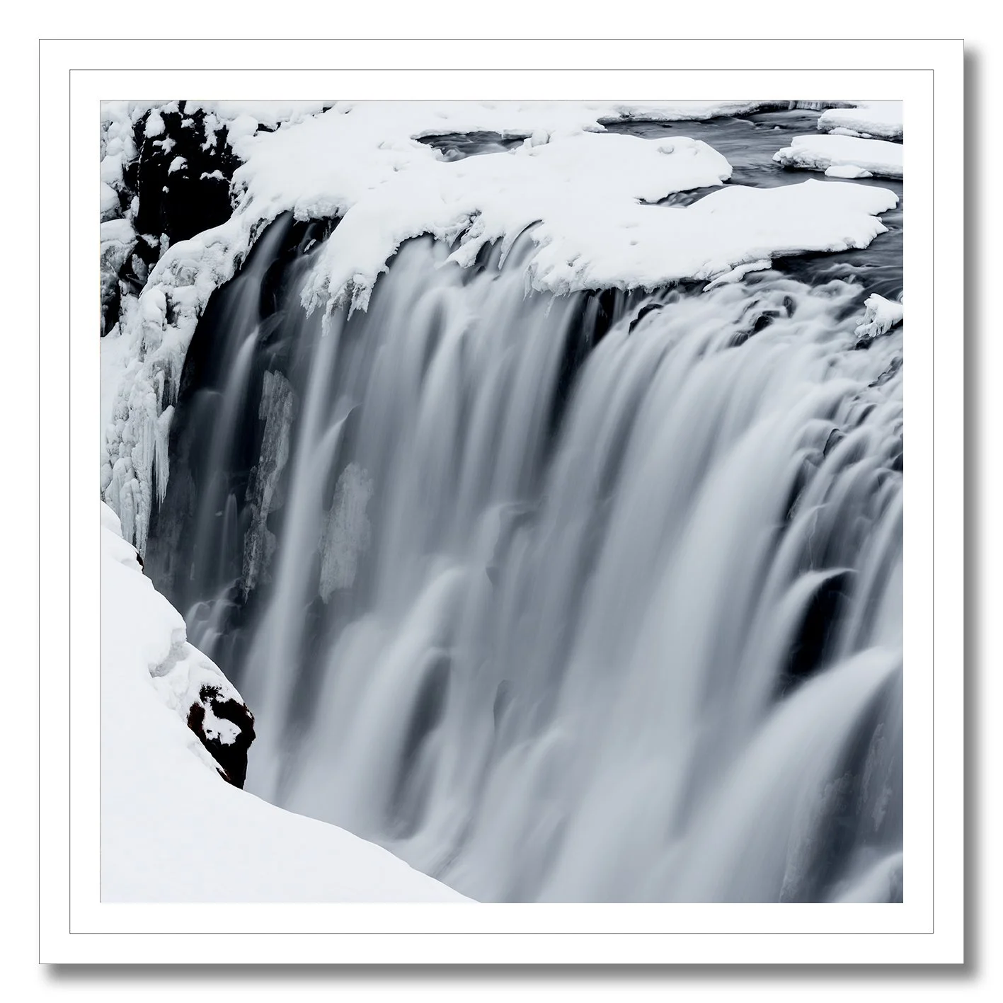 Fine art photograph of Gullfoss waterfall in Iceland covered in snow