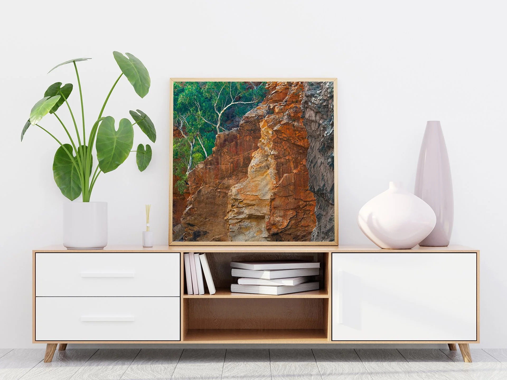 australian landscape photograph of red cliffs and gum trees in west macdonnell ranges