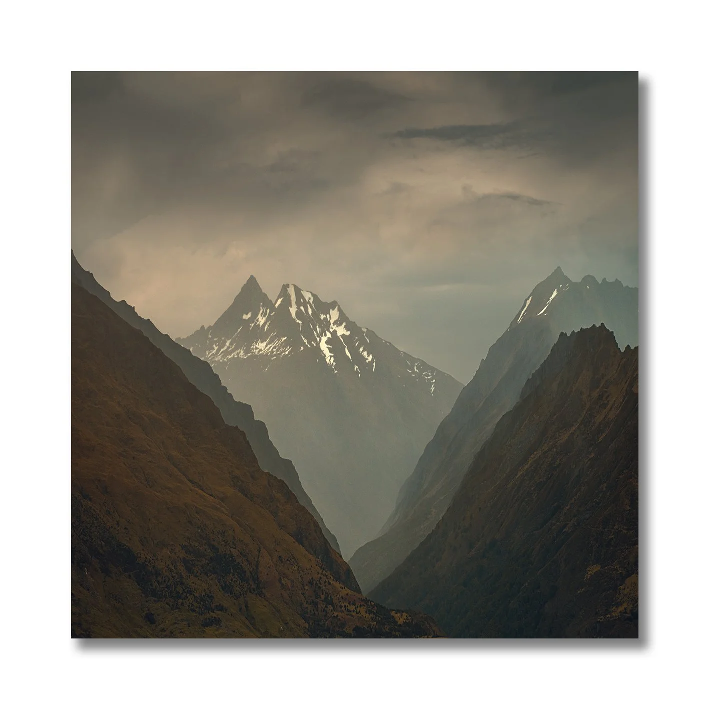 Mountain valley photography with snow peaks in New Zealand