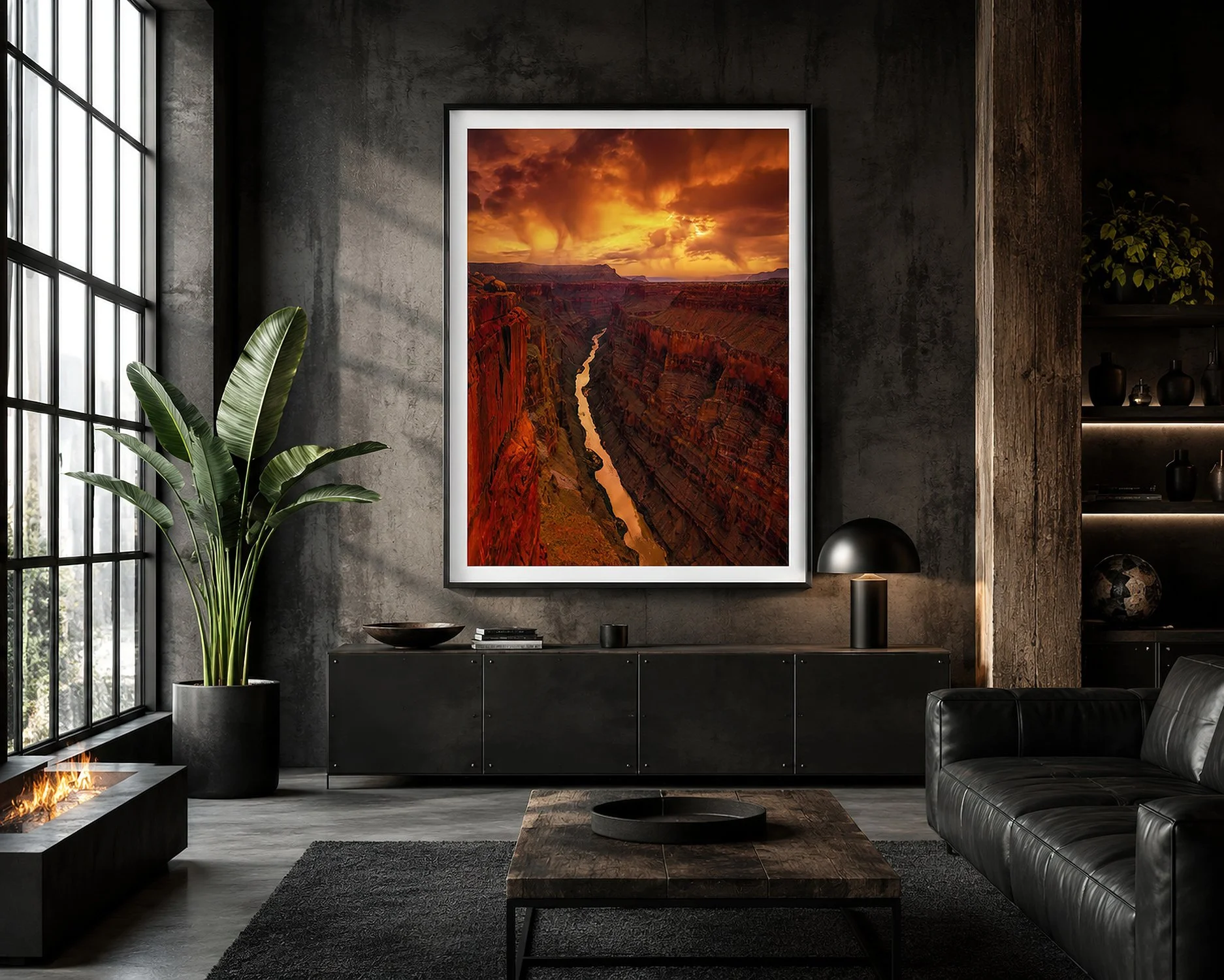 Framed Toroweap Grand Canyon photograph displayed in a dark industrial loft living room with concrete walls, black furnishings and dramatic natural light — Nick Psomiadis at NIKART Studio and Gallery.