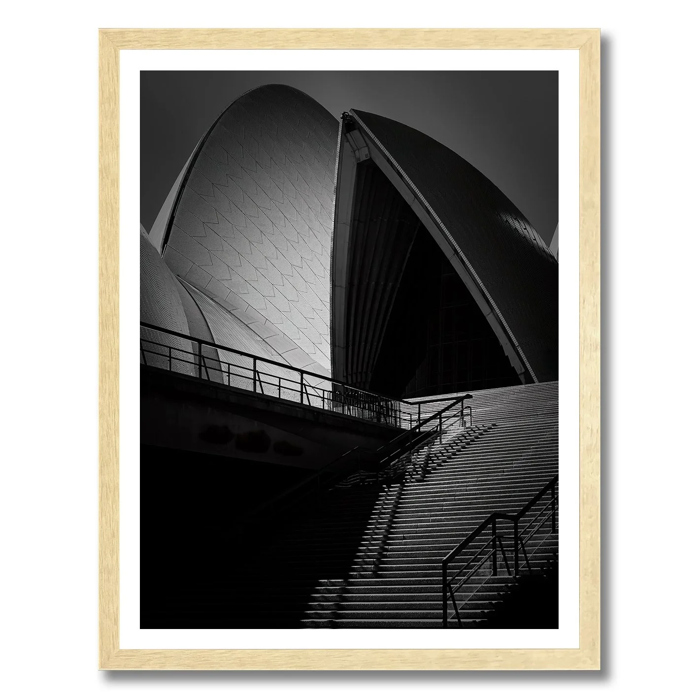 Black and white close-up of Sydney Opera House sails with dramatic lighting and shadows