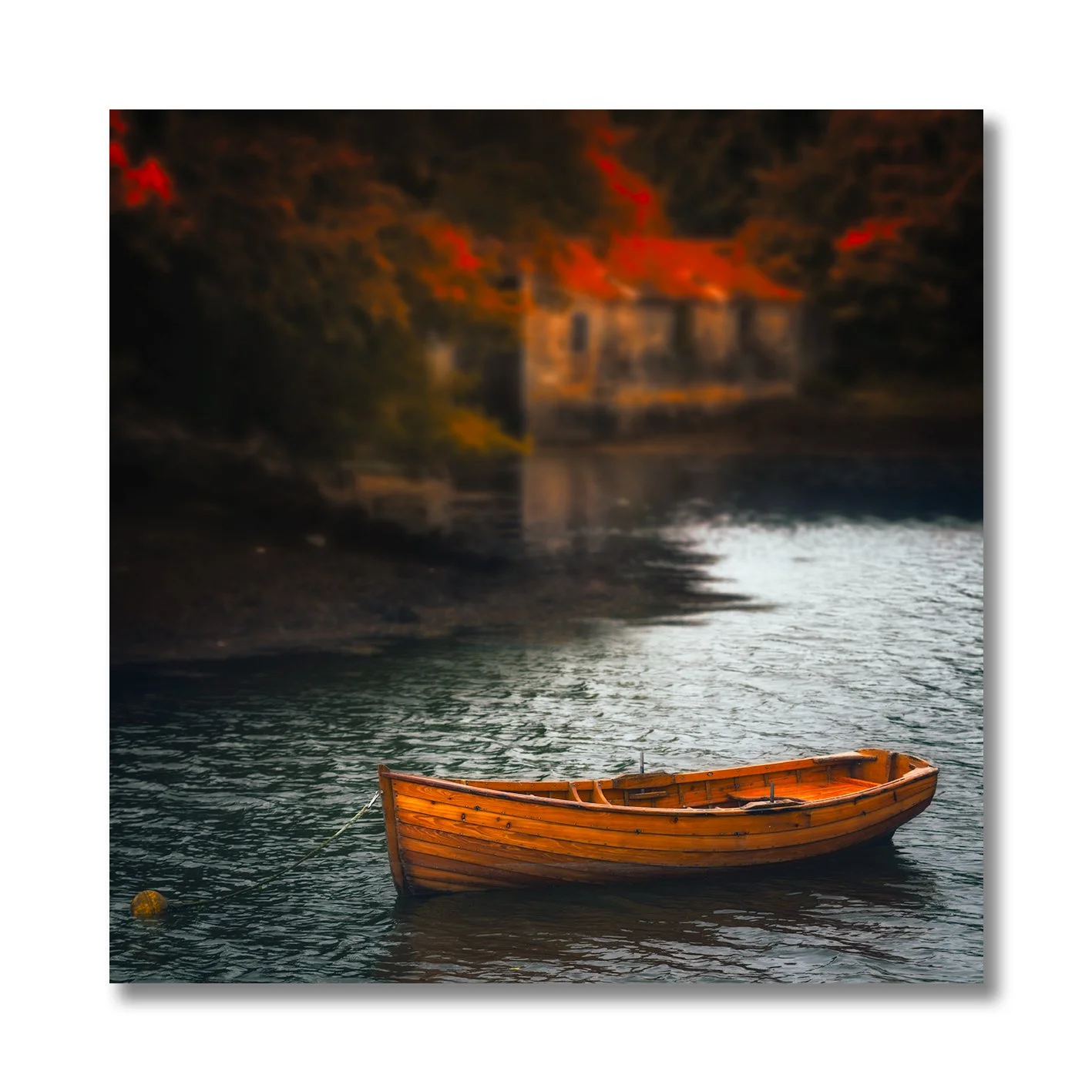 Fine art photograph of wooden boat floating on calm water in Ireland