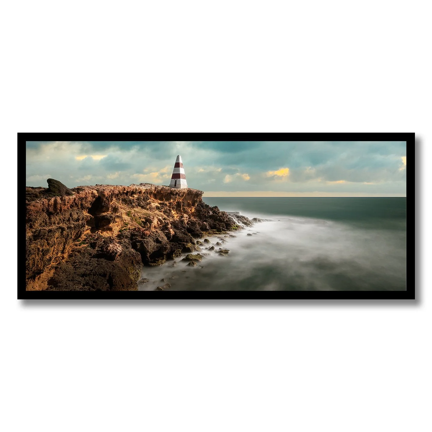 fine art photograph of the obelisk at robe south australia on rocky cliffs above the sea