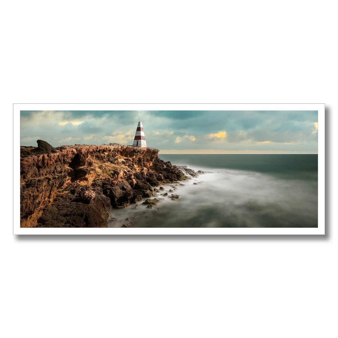 fine art photograph of the obelisk at robe south australia on rocky cliffs above the sea