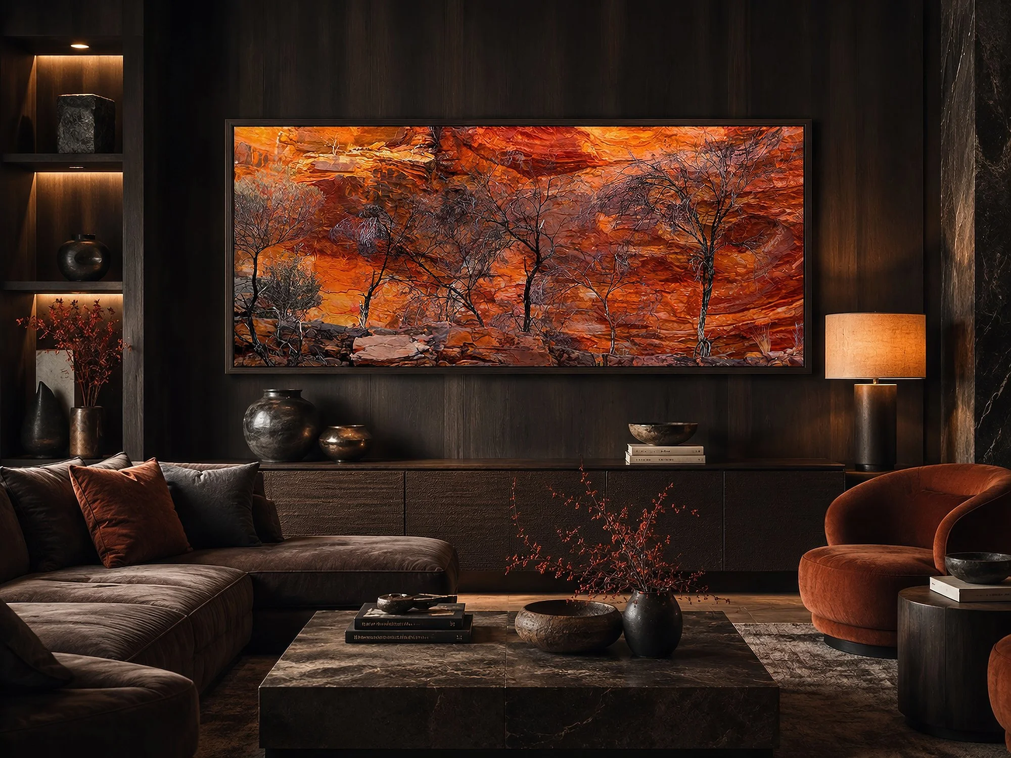 Dark wood-framed panoramic canvas of burnt trees against vivid orange canyon walls in a moody luxury living room with dark timber, marble and rust-toned décor, by Nick Psomiadis at NIKART Studio and Gallery