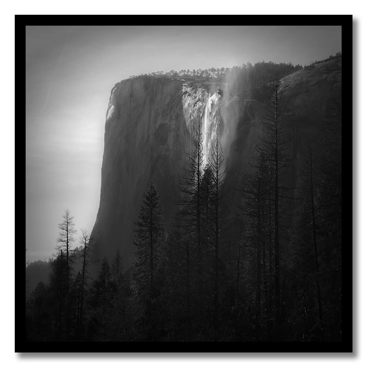 Black and white fine art photograph of Horsetail Falls waterfall in Yosemite National Park