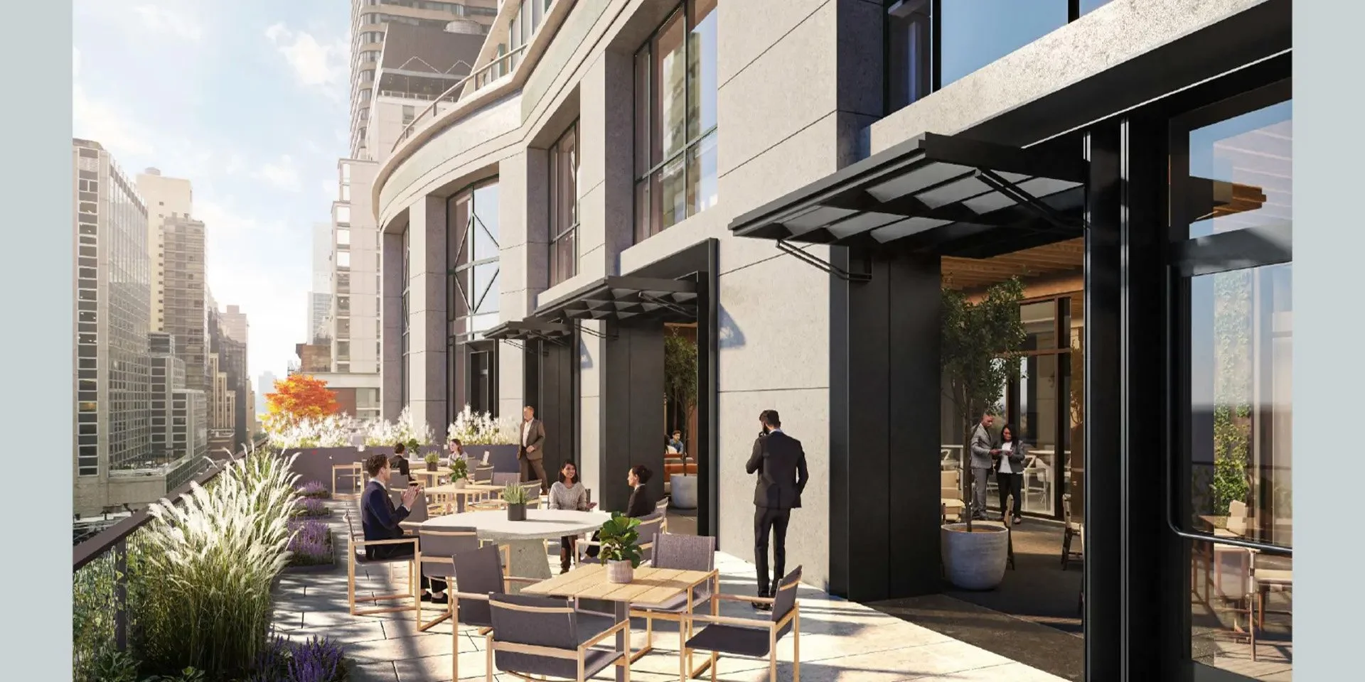 Rooftop terrace of a modern building with outdoor seating, potted plants, and City Skyline in the background.