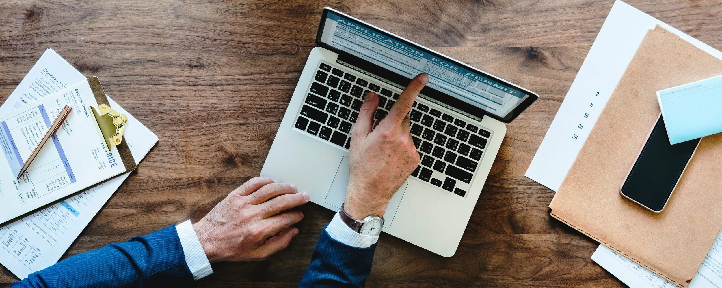 Australian business owner reviewing business loan facility options and cashflow timelines