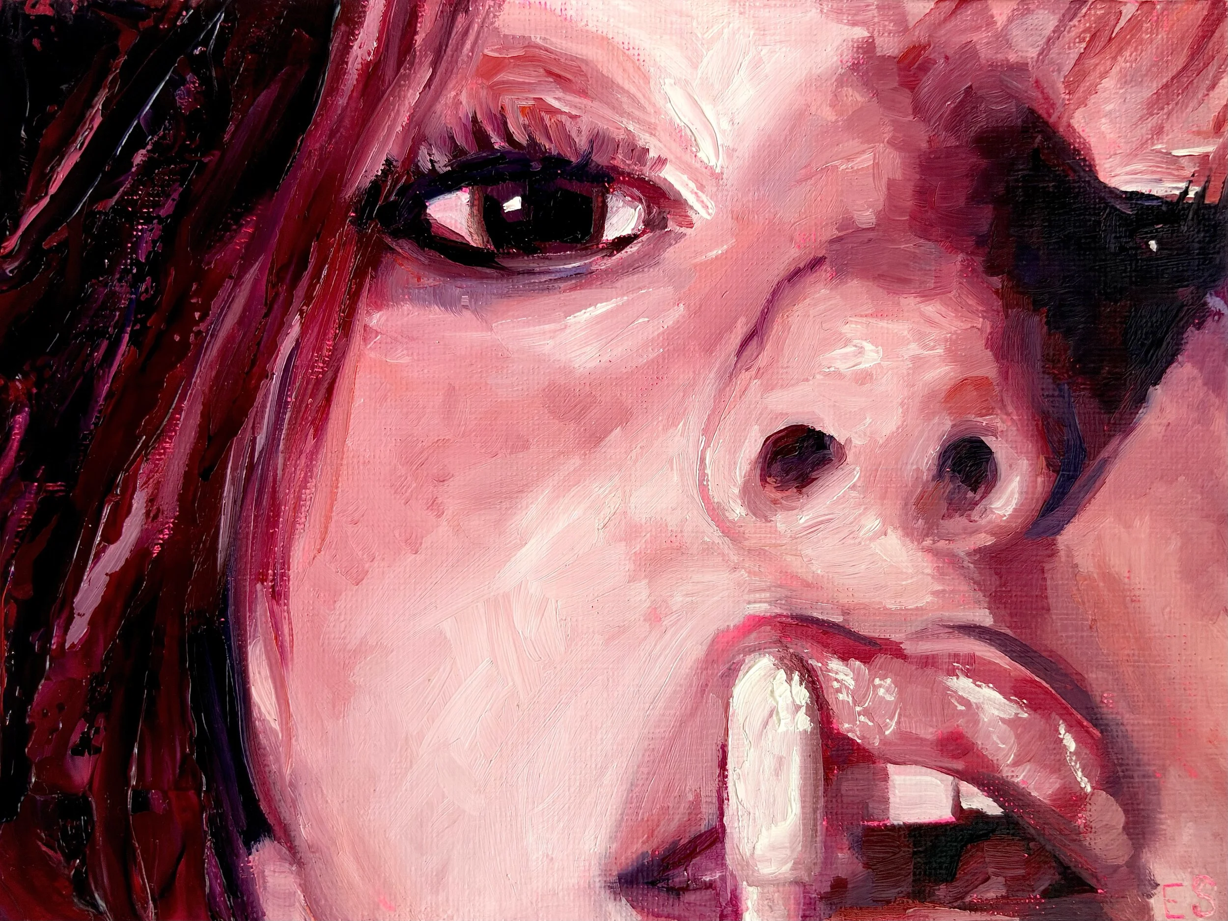applying lip gloss