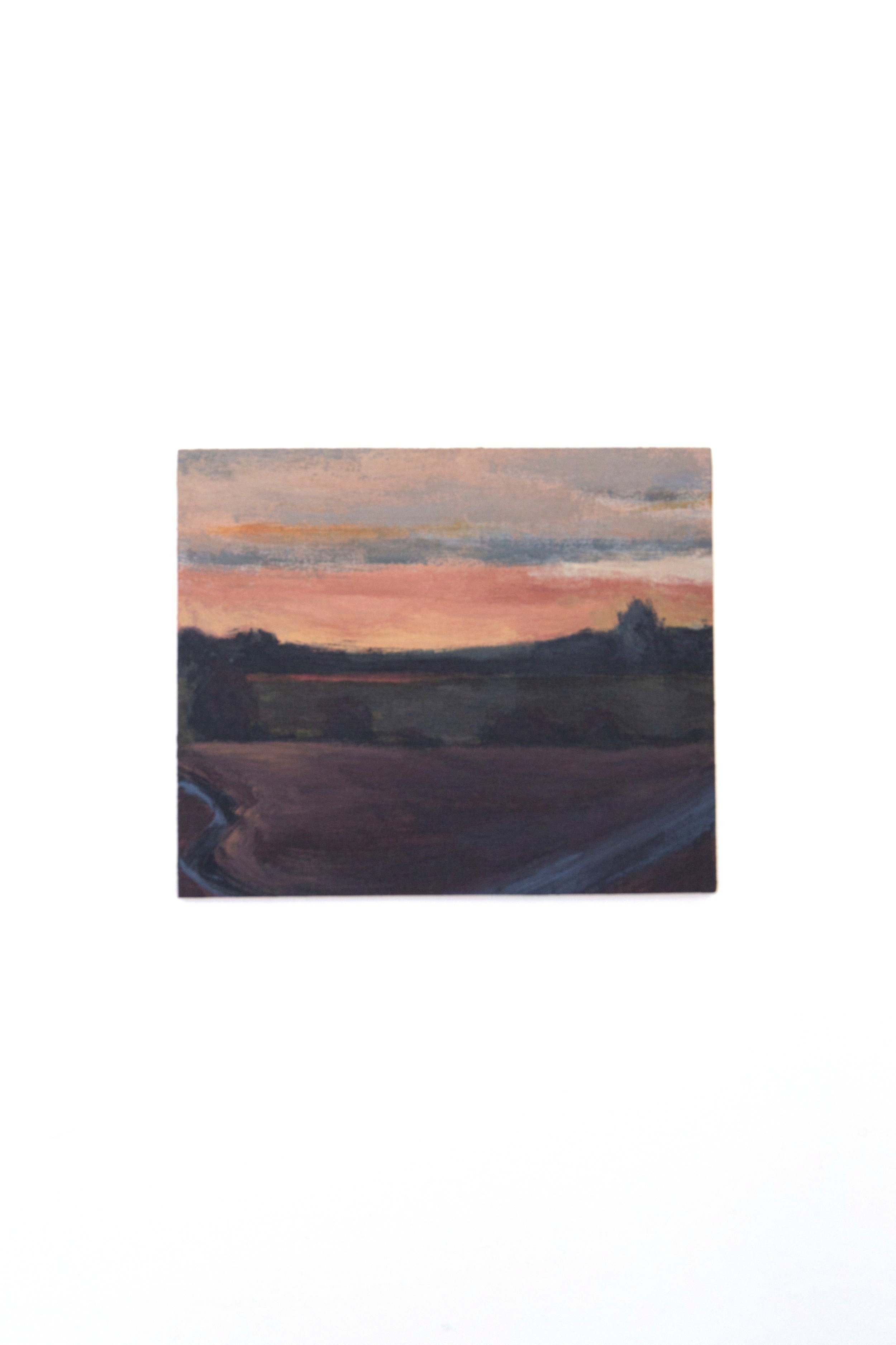 Painting of a sunset landscape with a sky in shades of pink and orange, and dark silhouette of trees and land in the foreground.