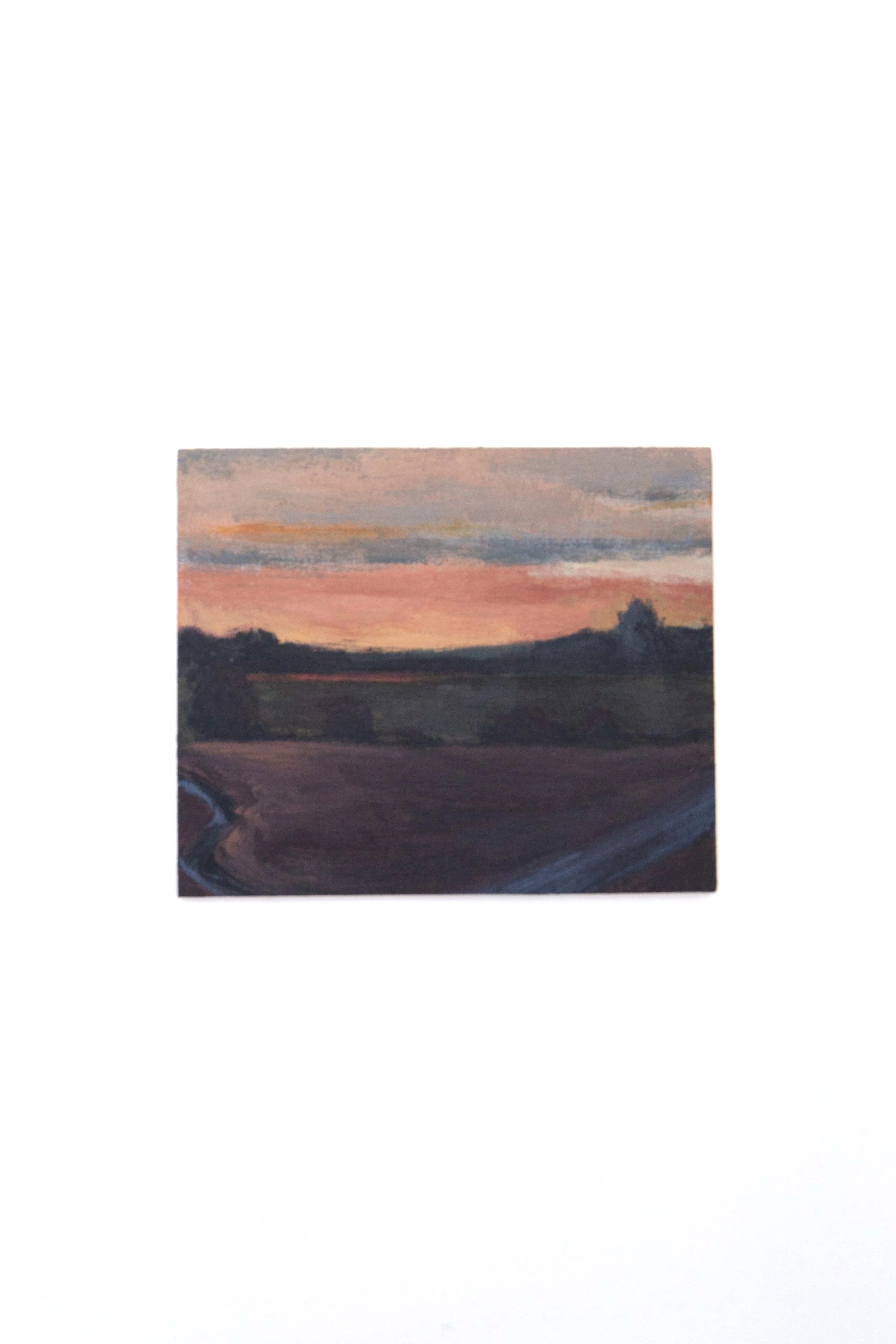 Painting of a sunset landscape with a sky in shades of pink and orange, and dark silhouette of trees and land in the foreground.