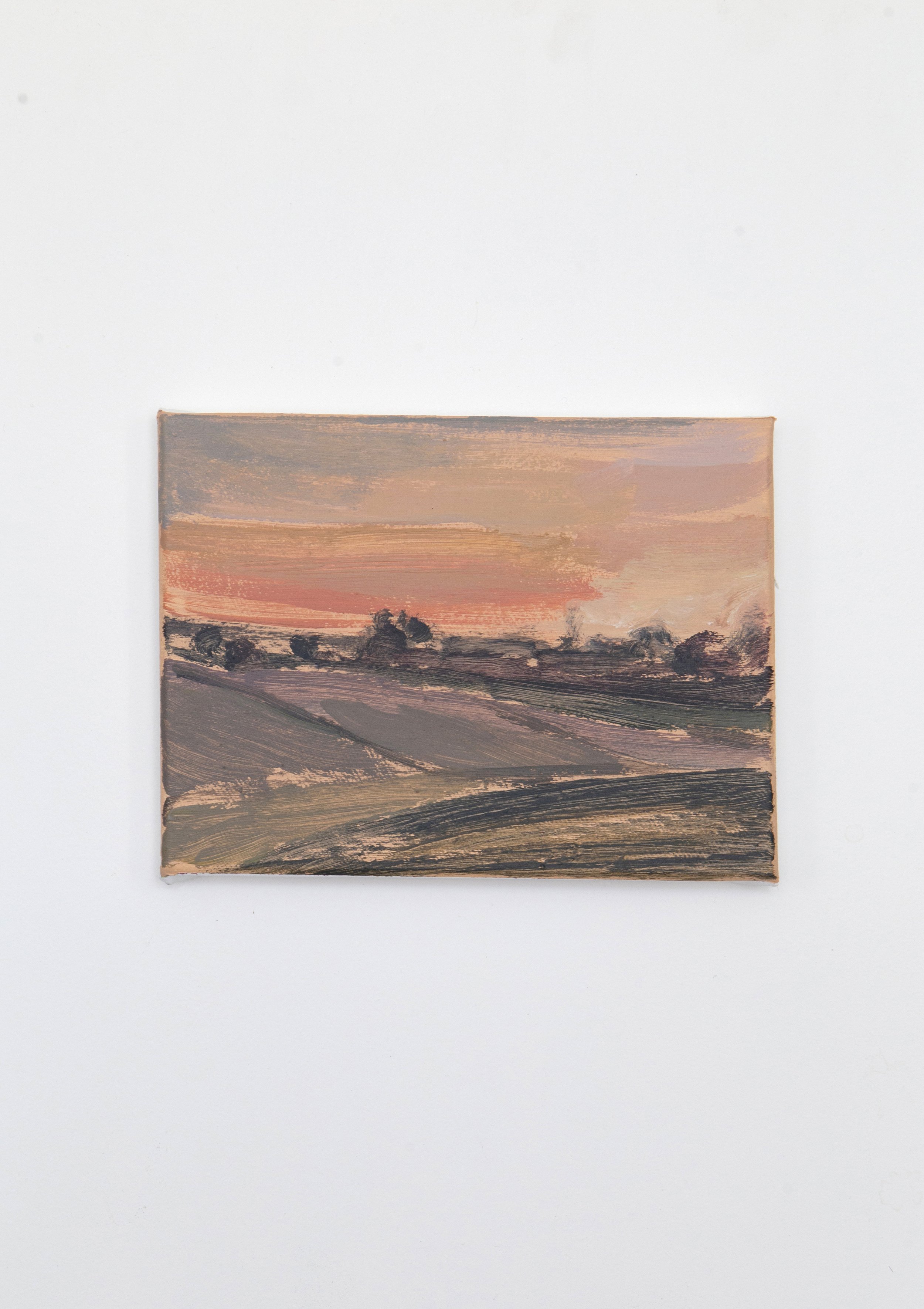 A landscape painting of rolling fields at sunset with a pinkish-orange sky and scattered trees in the distance.