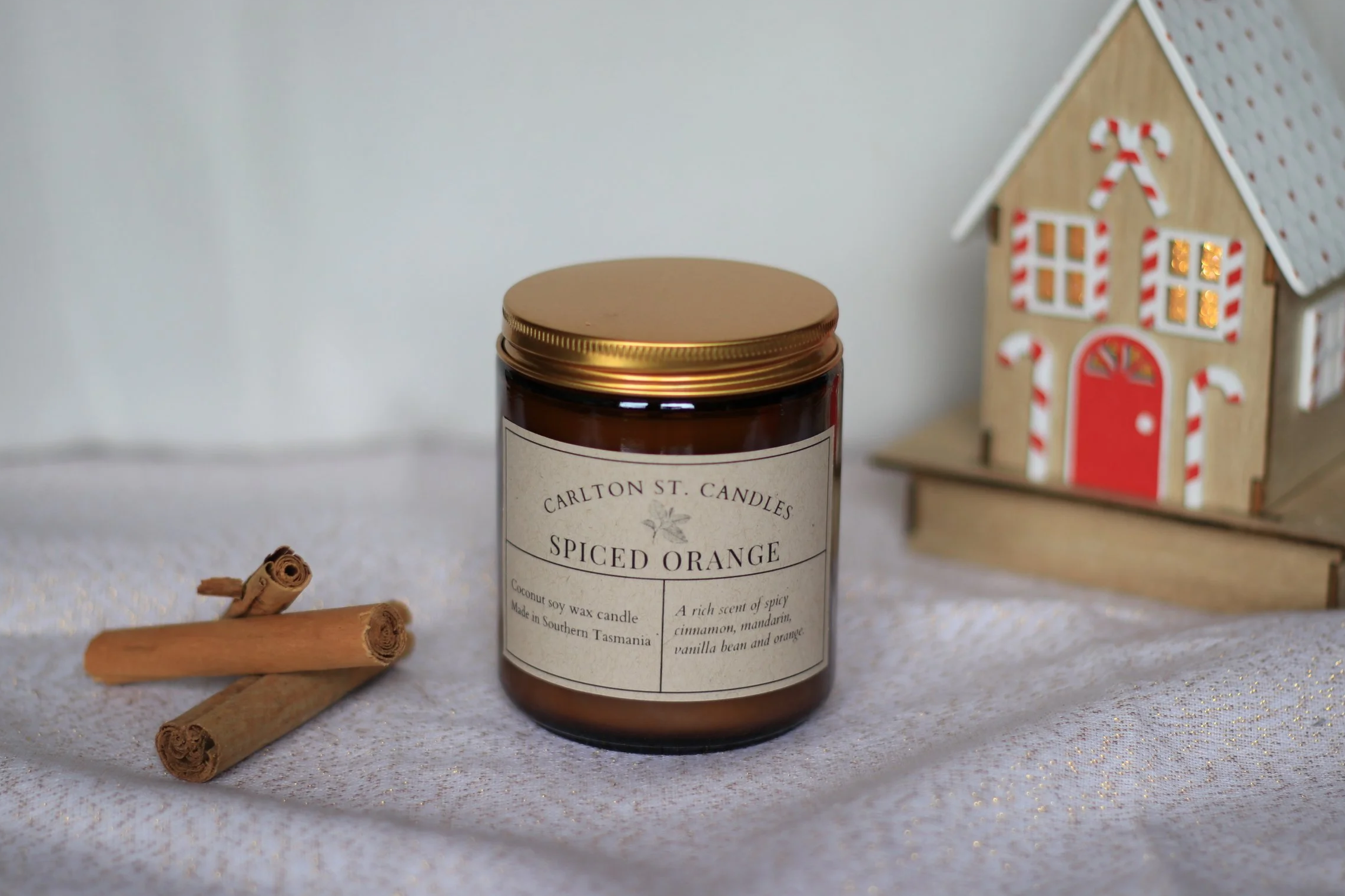 Candle+w+lid+cinnamon+and+house.png