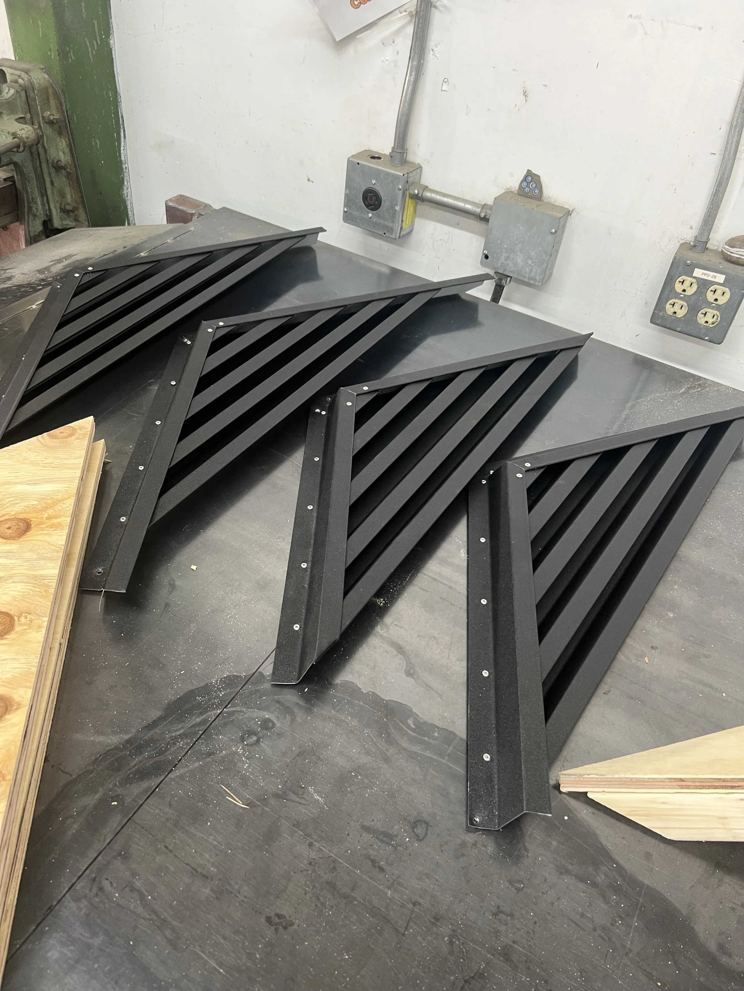 Custom prefabricated louvre vents in GreenCoat PLX