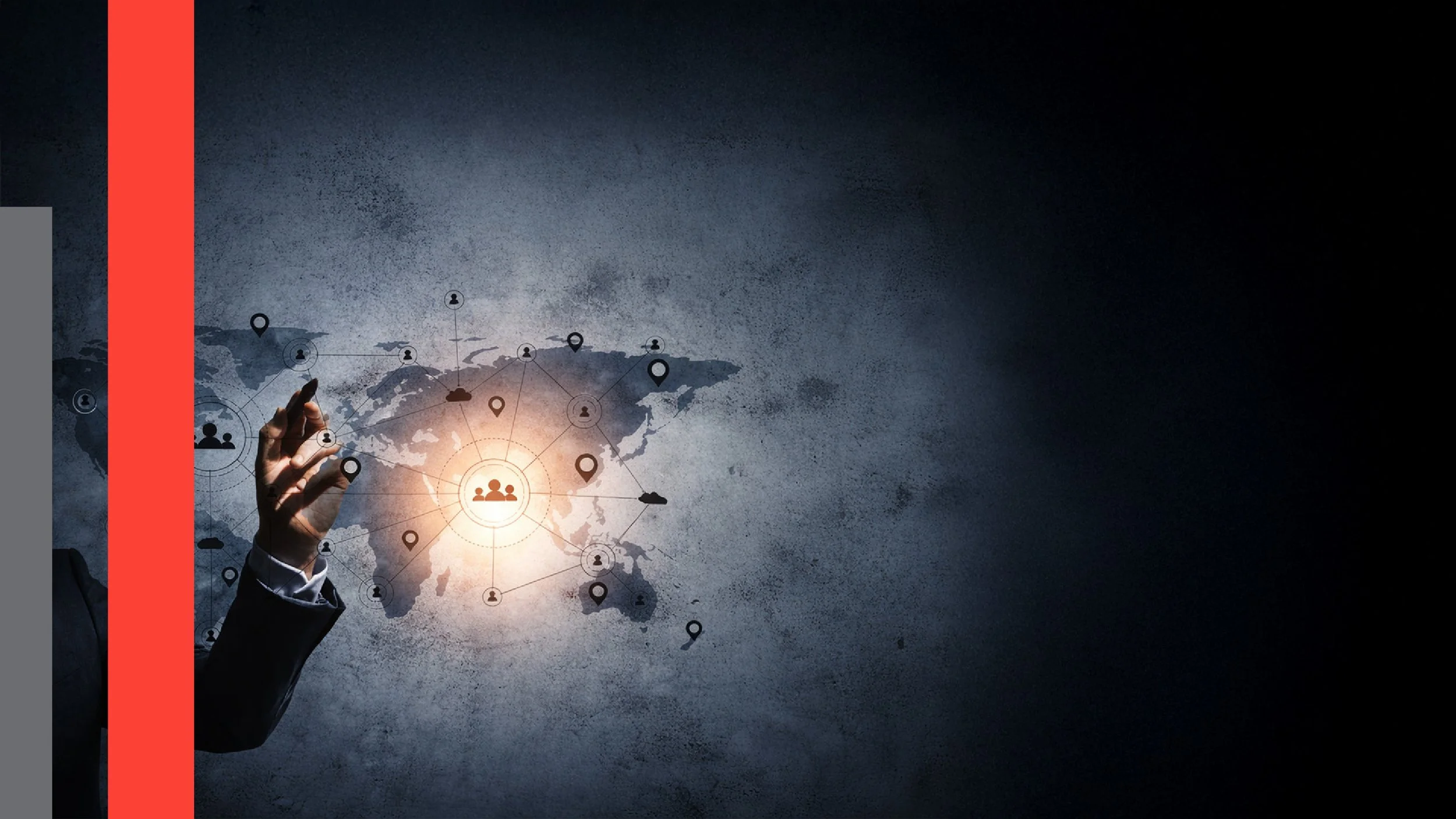 A person in a business suit with a white shirt is pointing towards a world map with interconnected location markers and icons representing people, suggesting global connectivity or networking.