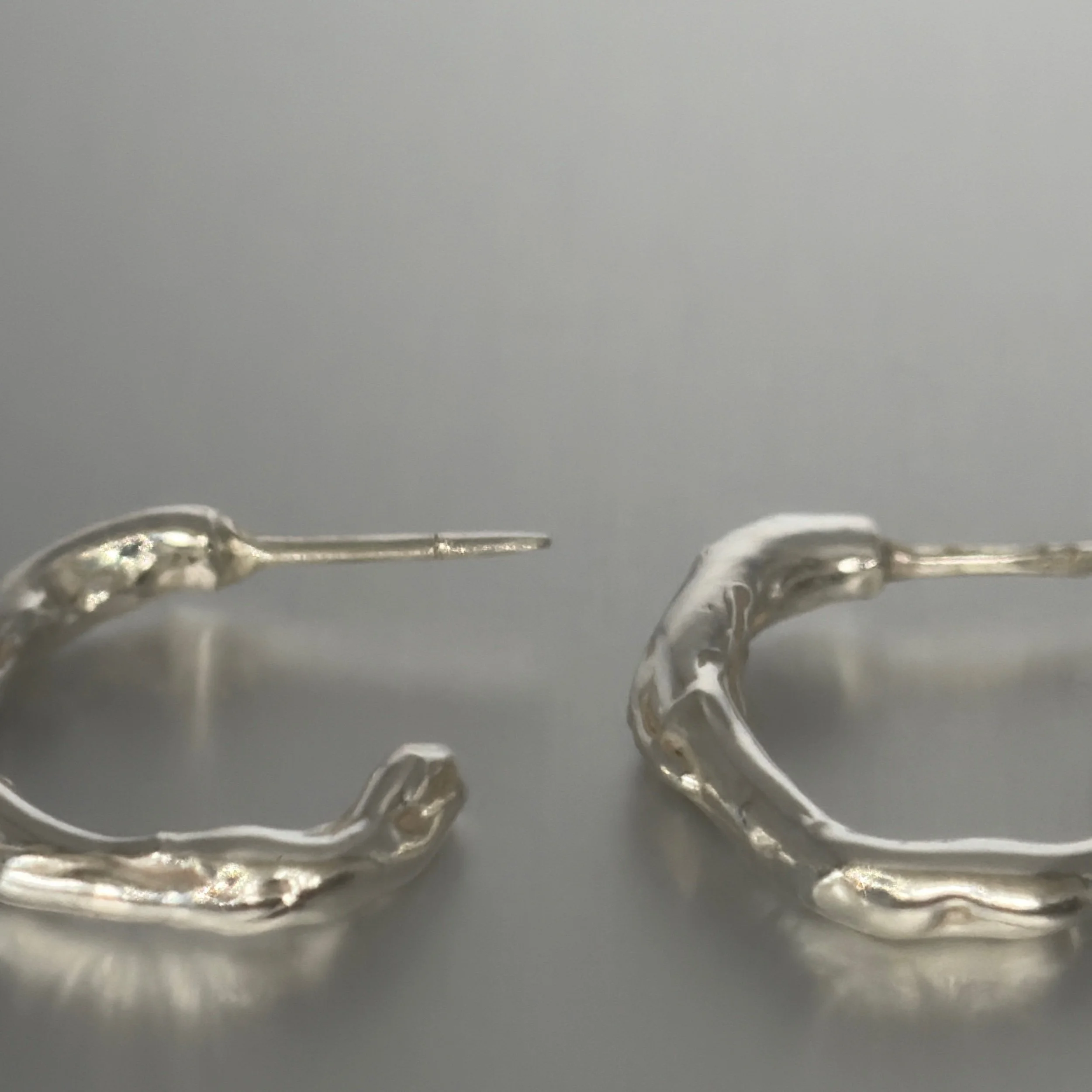 organic-texture-silver-hoops-close-up.jpg