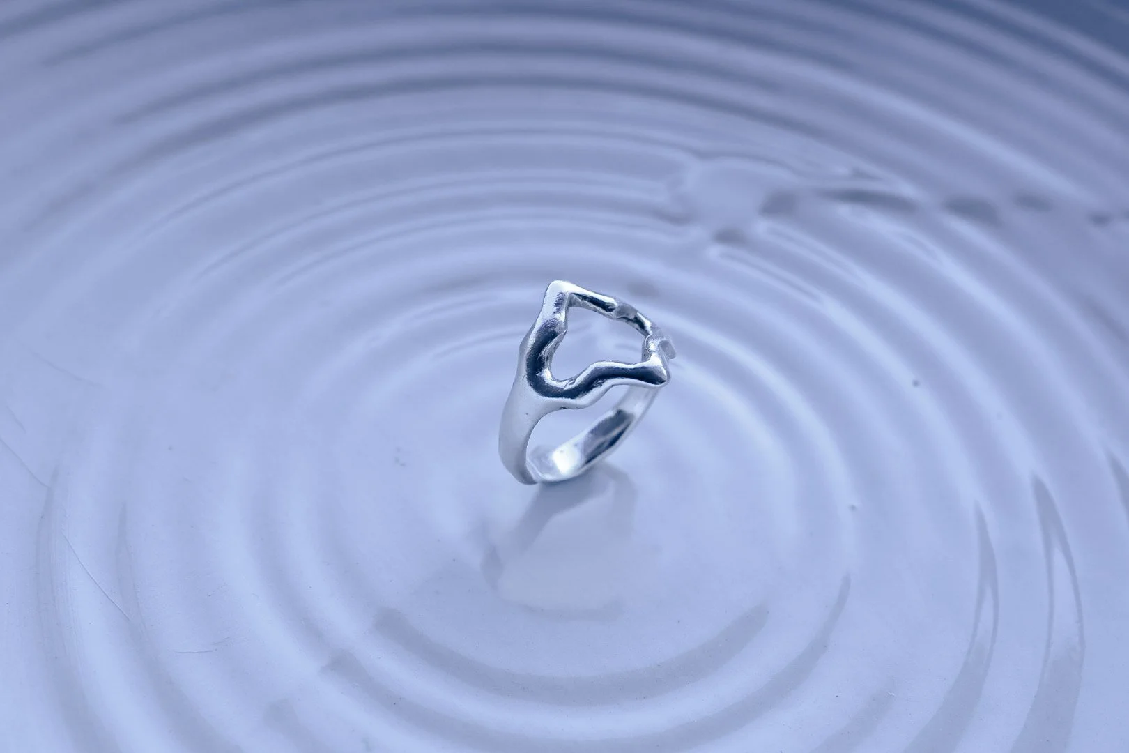 Handmade sterling silver ring inspired by life’s highs and lows. A sculptural, organic lost-wax design—unique, meaningful, and slow-made.
