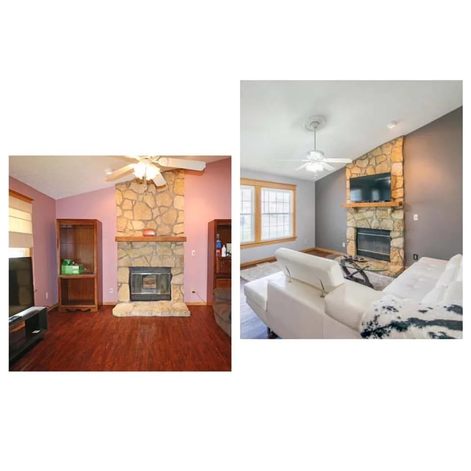 Two living rooms with stone fireplaces and ceiling fans, one with purple walls and reddish-brown floor, the other with gray walls and light wood trim, each with a TV mounted above the fireplace.