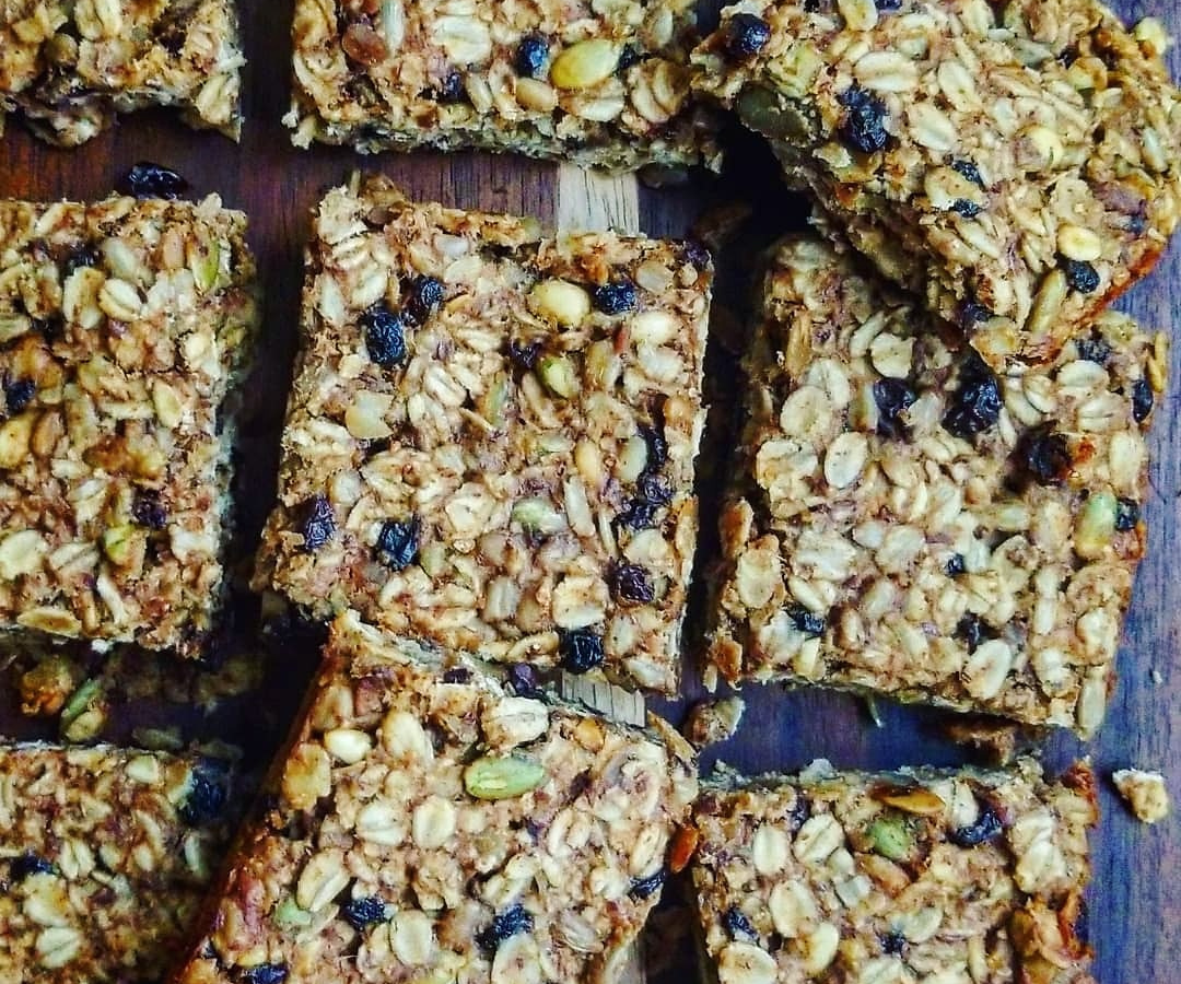 Blueberry and Granola baked squares on a baking sheet