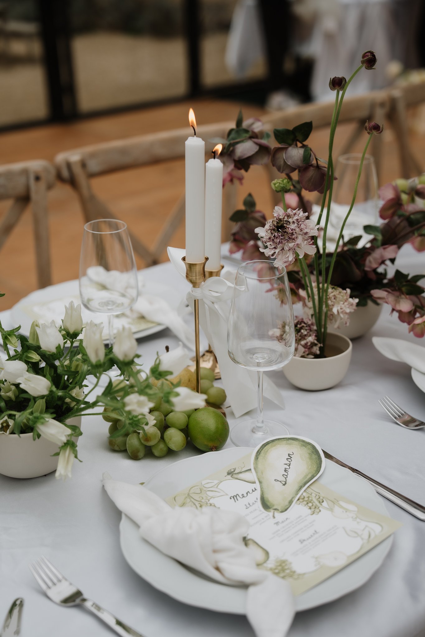 🍐🎀Delicate green bows, pears, grapes, and soft florals brought to life on hand-painted watercolour menus. 🍐🍇✨ Pear name cards add a whimsical touch, giving the stationery a fresh, modern feel with a hint of vintage.

Stylist: @wildswanweddings
Ph
