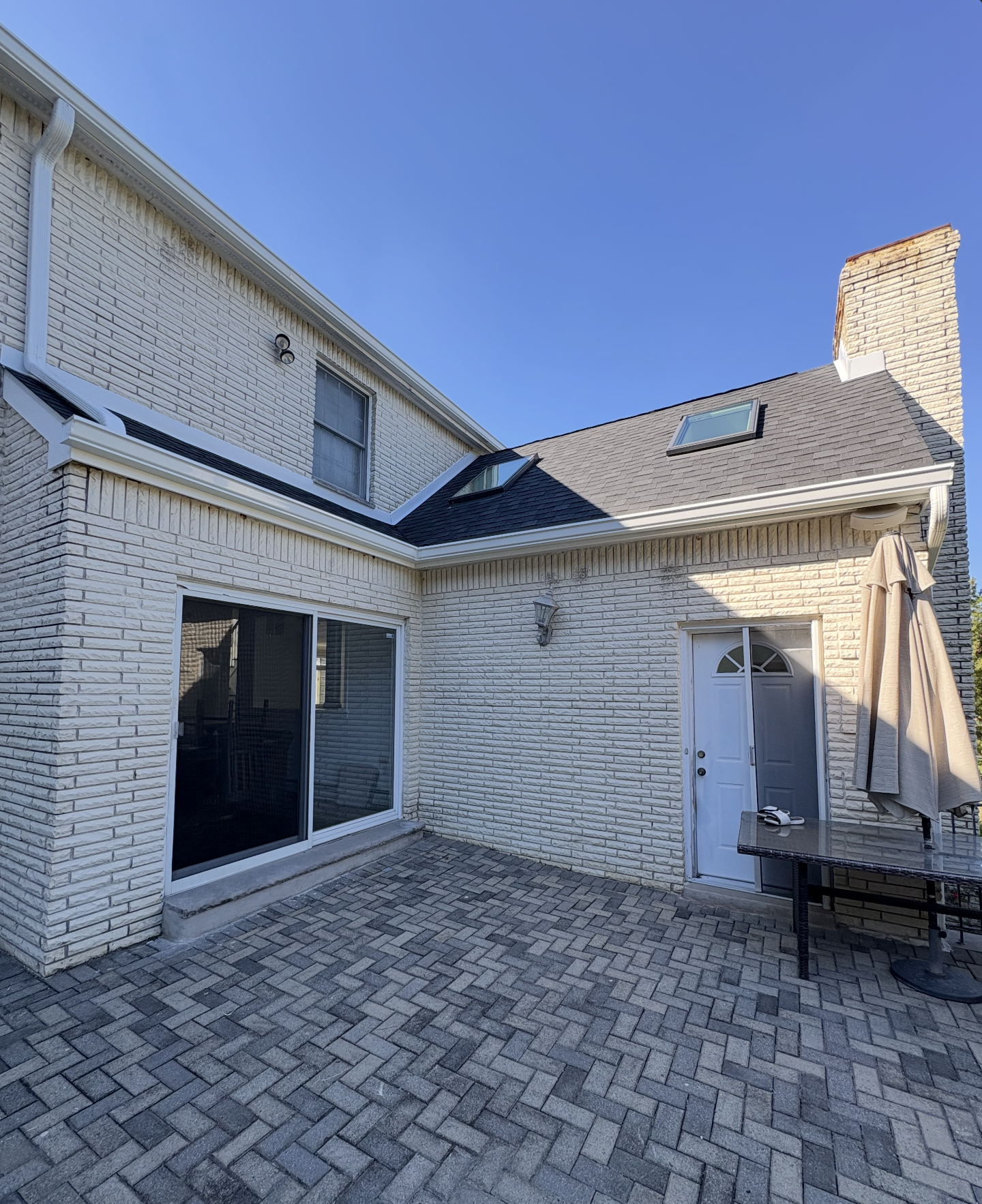 New trim wood, skylight, & gutters