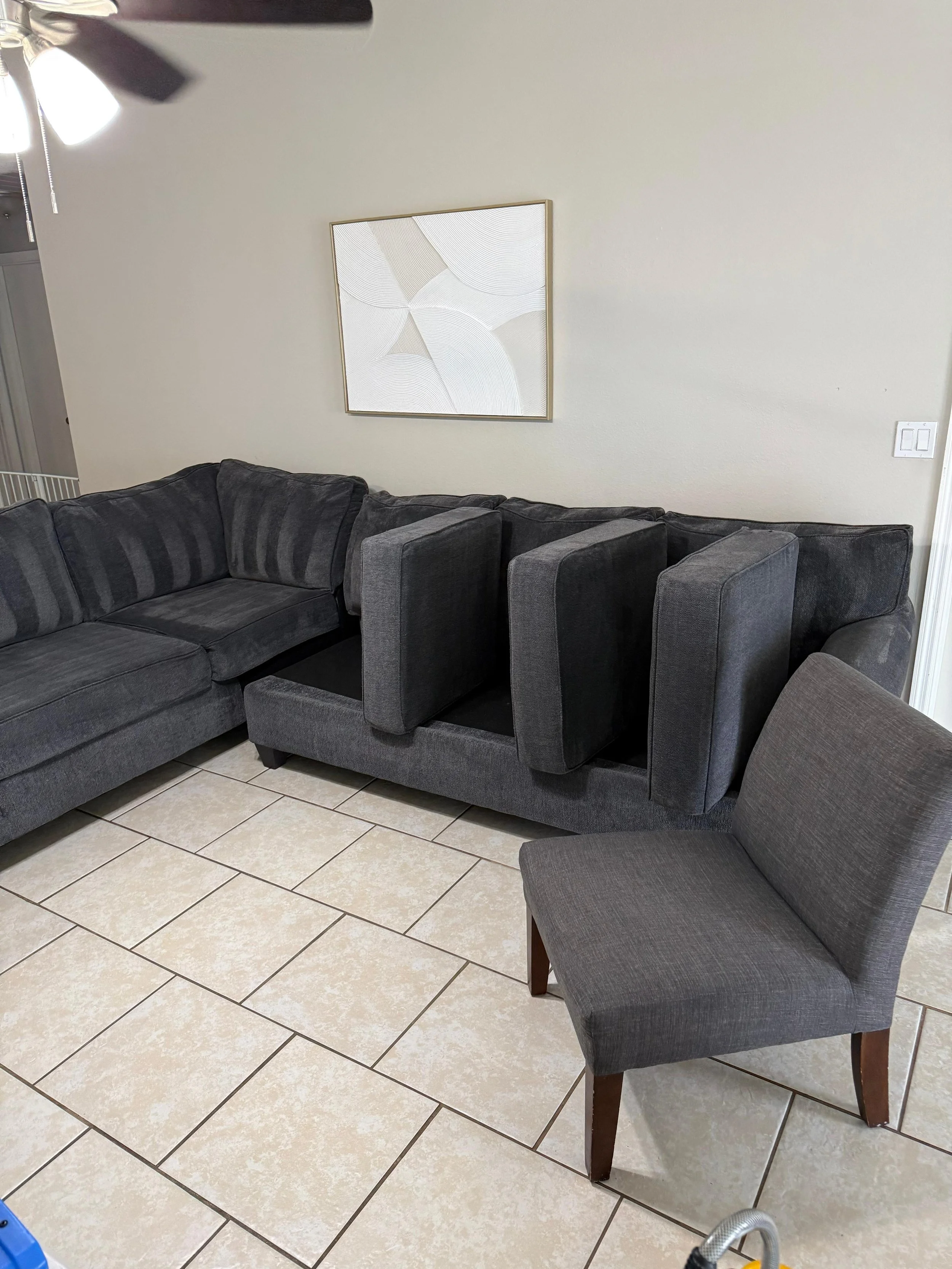Beige sectional sofa refreshed with even color and softer fabric after professional couch and upholstery cleaning in Orlando by Mint.