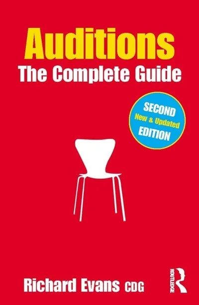 Book cover titled "Auditions: The Complete Guide" with a red background, yellow and white text, a blue badge indicating 'Second Edition,' and a white silhouette of a chair.