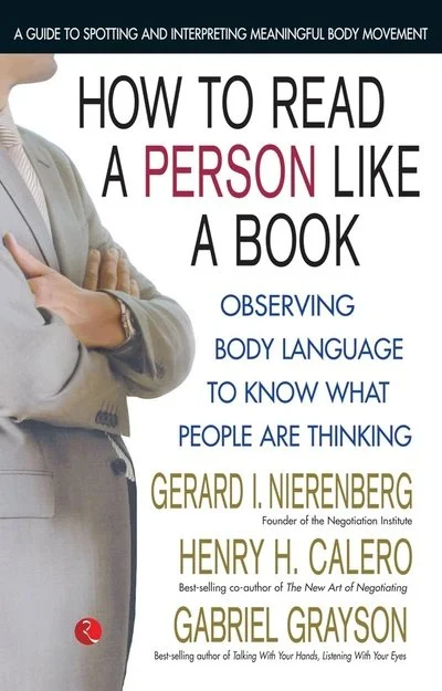 Book cover titled 'How to Read a Person Like a Book' with subtitle 'Observing Body Language to Know What People Are Thinking.' The authors are Gerard J. Nierenberg, Henry H. Calero, and Gabriel Grayson, whose names and credentials are listed below. The cover features a person in a gray suit with crossed arms on the left.