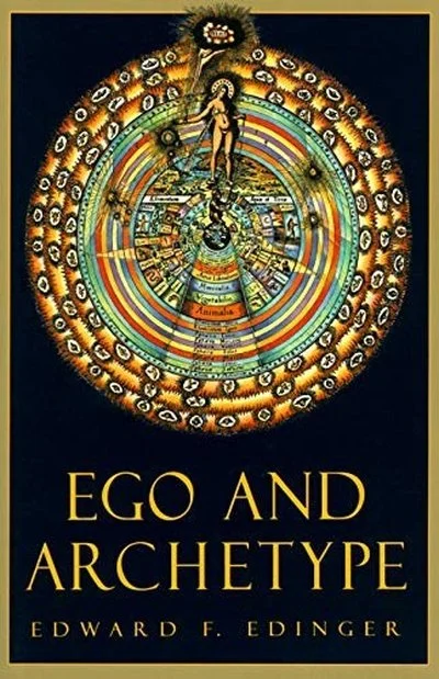 The cover of a book titled "Ego and Archetype" by Edward F. Edinger showing a colorful, circular mandala with various symbols and figures.