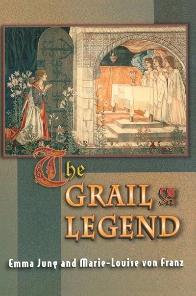 Cover of a book titled "The Grail Legend" by Emma Jung and Marie-Louise von Franz. The cover features an illustration of a woman in a medieval dress reading a book, standing near a stone archway leading to a scene with a table and four women dressed in white, with a background of plants and a dark sky.