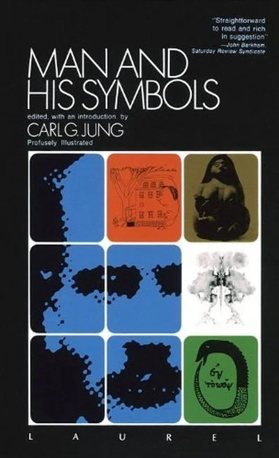 Book cover of "Man and His Symbols," edited by Carl G. Jung, with an introduction by. The cover features a grid of nine squares with various abstract and symbolic images, including a face, tree, snake, and geometric shapes, in blue, red, black, white, and green colors.