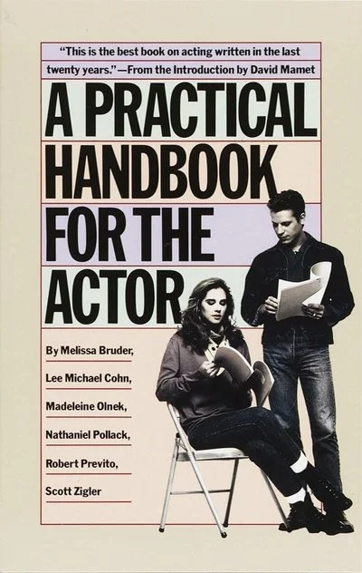Cover of the book titled 'A Practical Handbook for the Actor' featuring a man and a woman holding scripts, with the title in bold black and purple text.