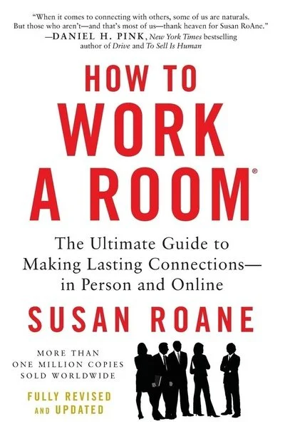 Cover of the book titled "How to Work a Room" by Susan Roane, with a subtitle "The Ultimate Guide to Making Lasting Connections in Person and Online". The cover features a black silhouette of five people in business attire.