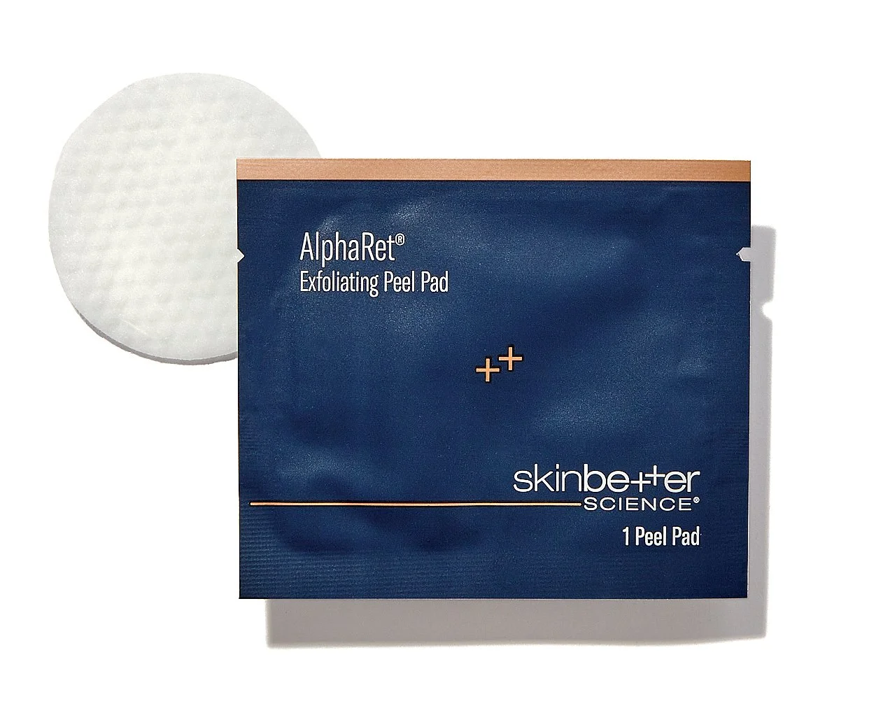 AlphaRet exfoliating peel pad in blue packaging with sample pad next to it, designed for skincare