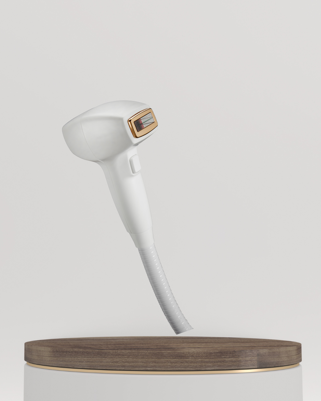 A white handheld device with a digital screen and a golden frame, mounted on a flexible white tube, displayed on a round wooden platform against a plain light gray background.