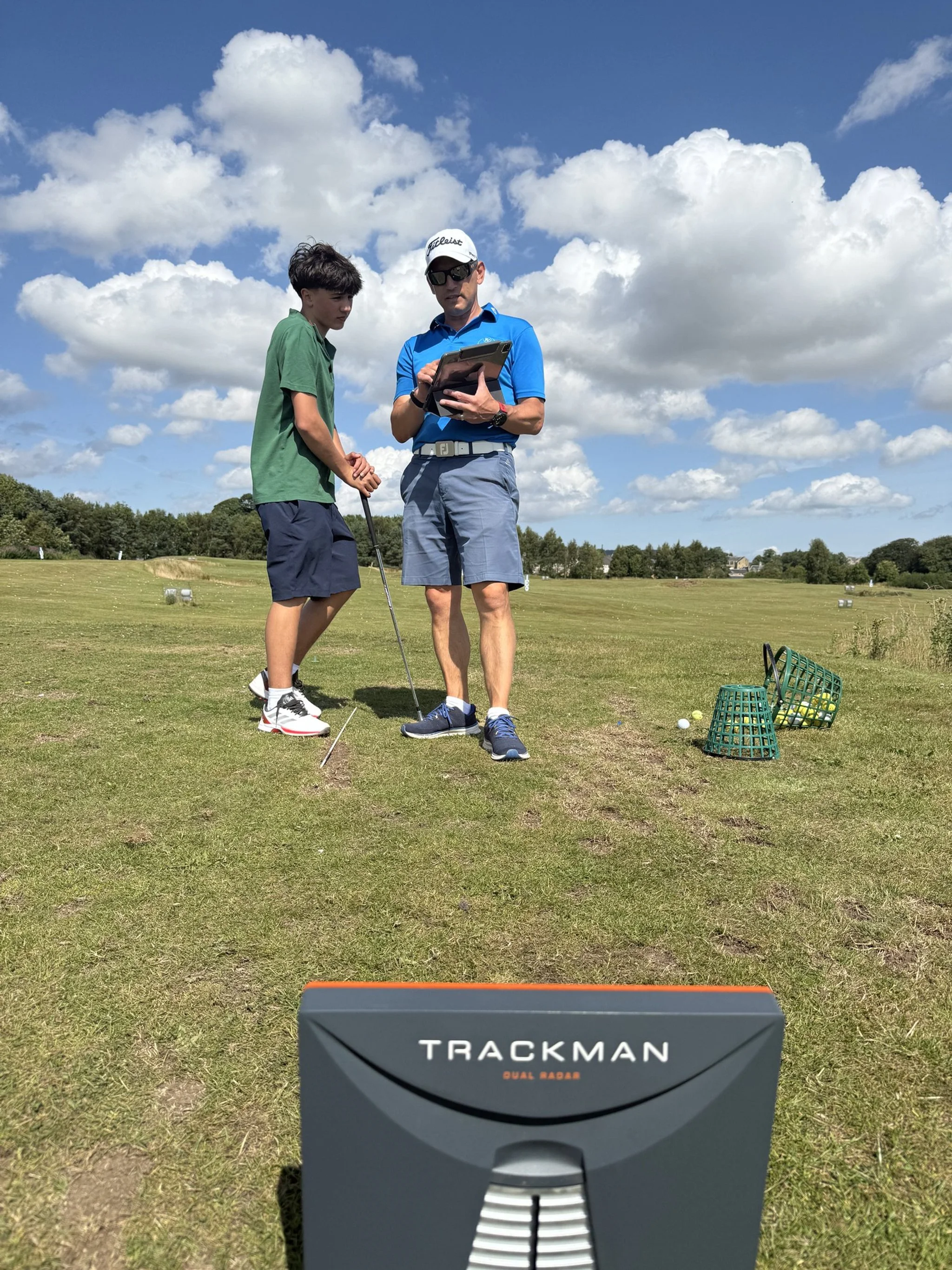 PGA golf coach providing individual junior golf coaching using TrackMan technology at RV Golf Schools.