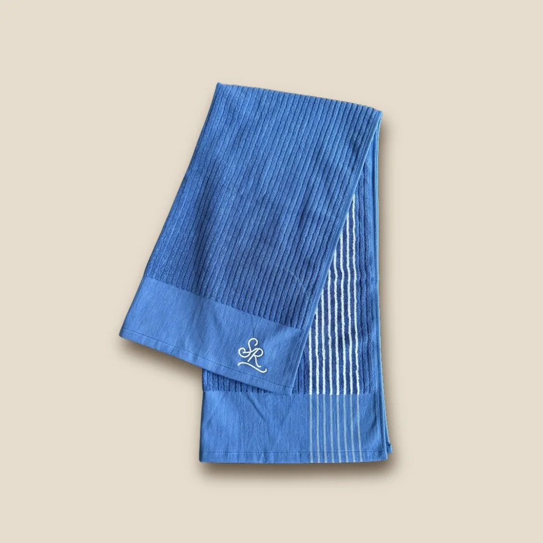 sunday-rolls-golf-towel-blue-draped.jpg