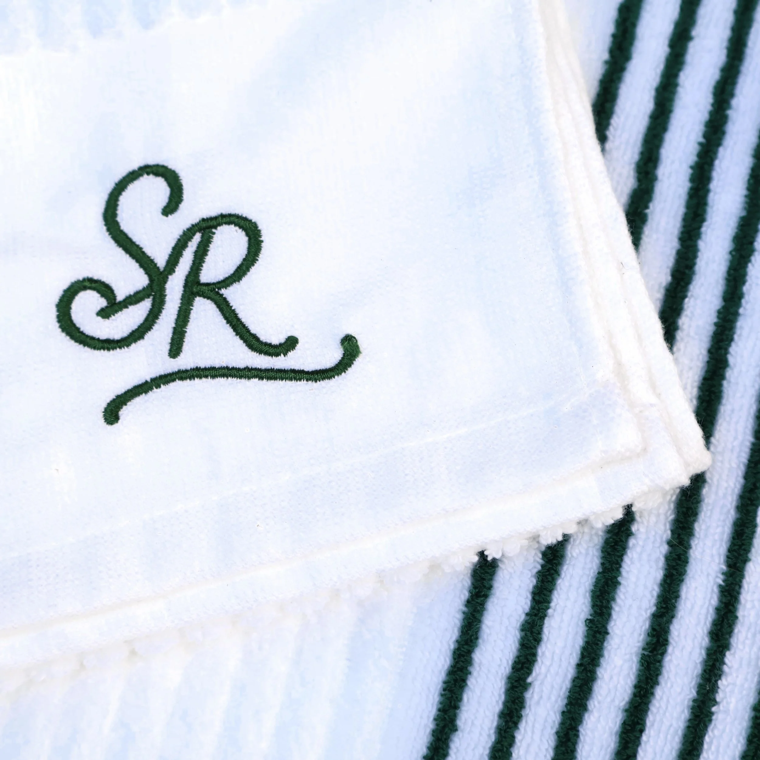sunday-rolls-golf-towel-green-stripe-logo-detail.jpg