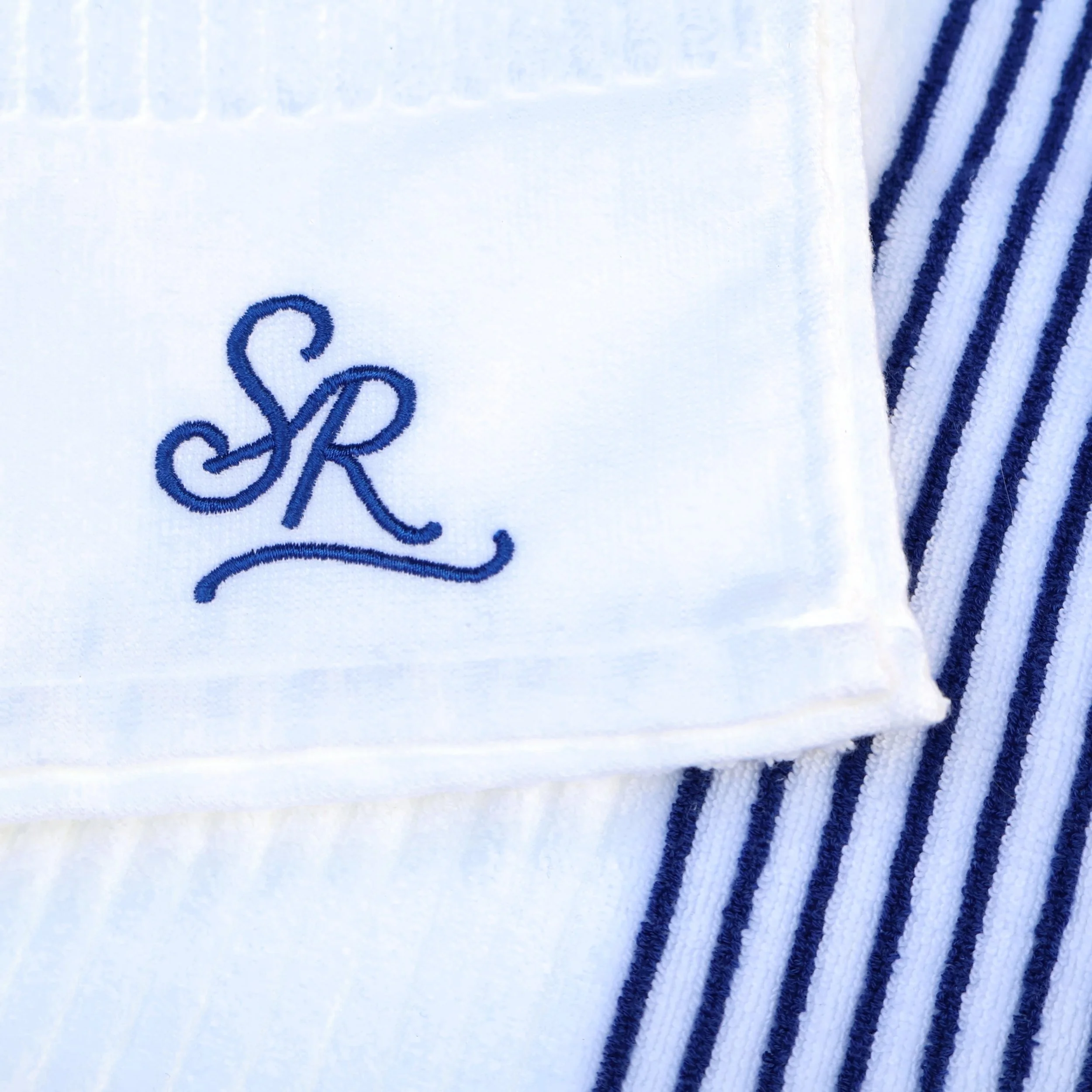 sunday-rolls-golf-towel-blue-embroidered-logo-detail.jpg