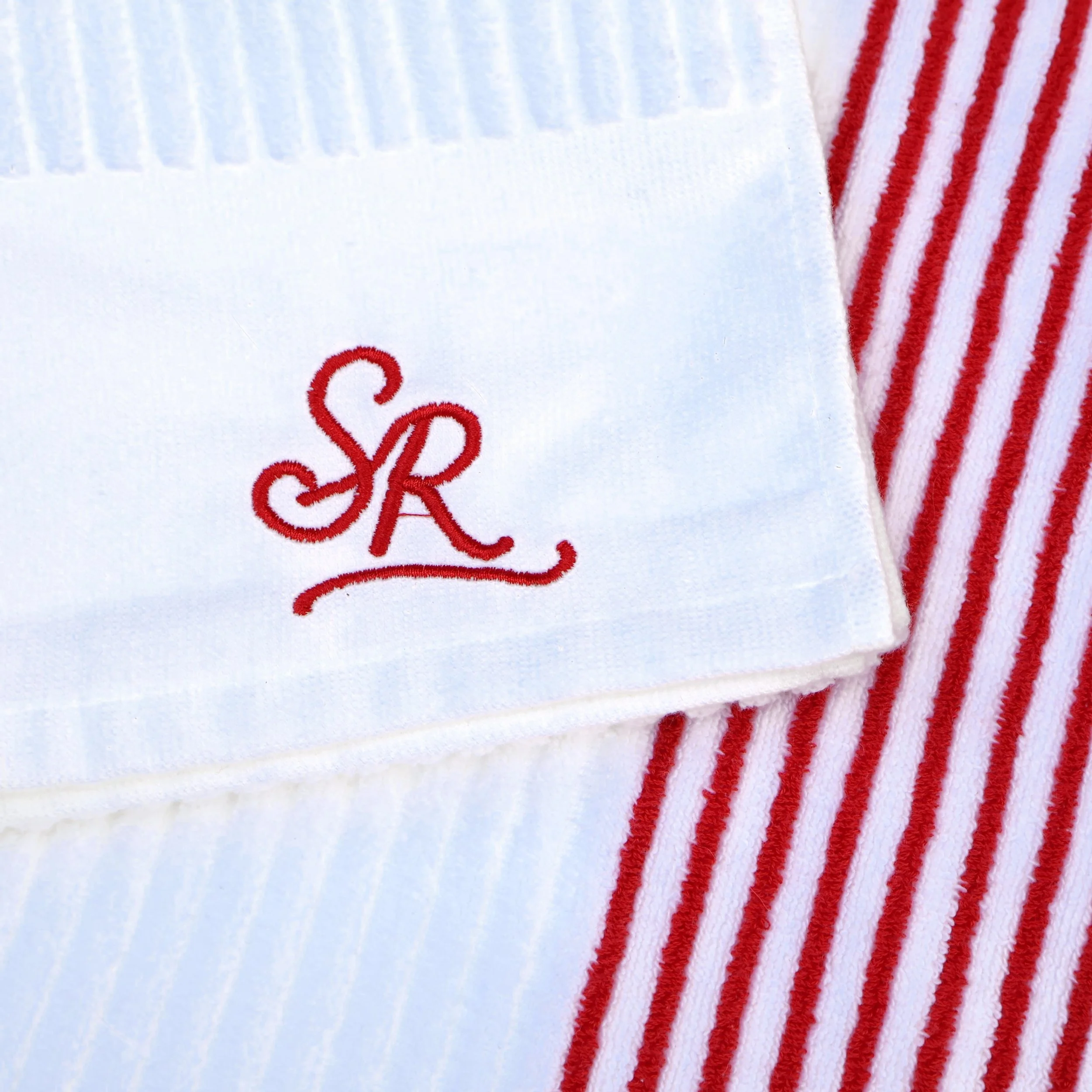 sunday-rolls-golf-towel-red-embroidered-logo-detail.jpg
